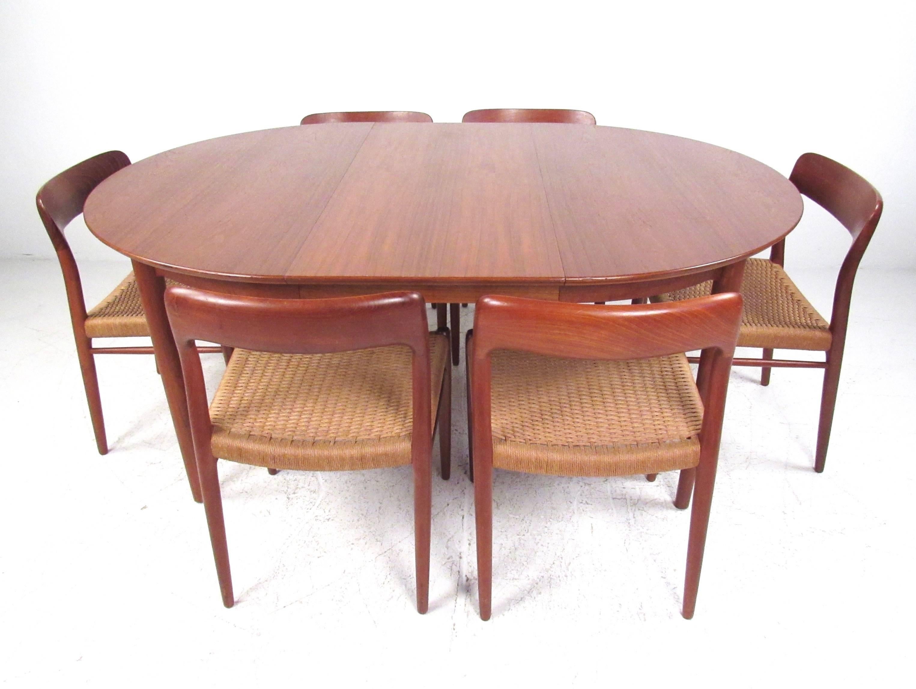 Mid-Century Modern N.O. Møller Teak Dining Table With Papercord Chairs