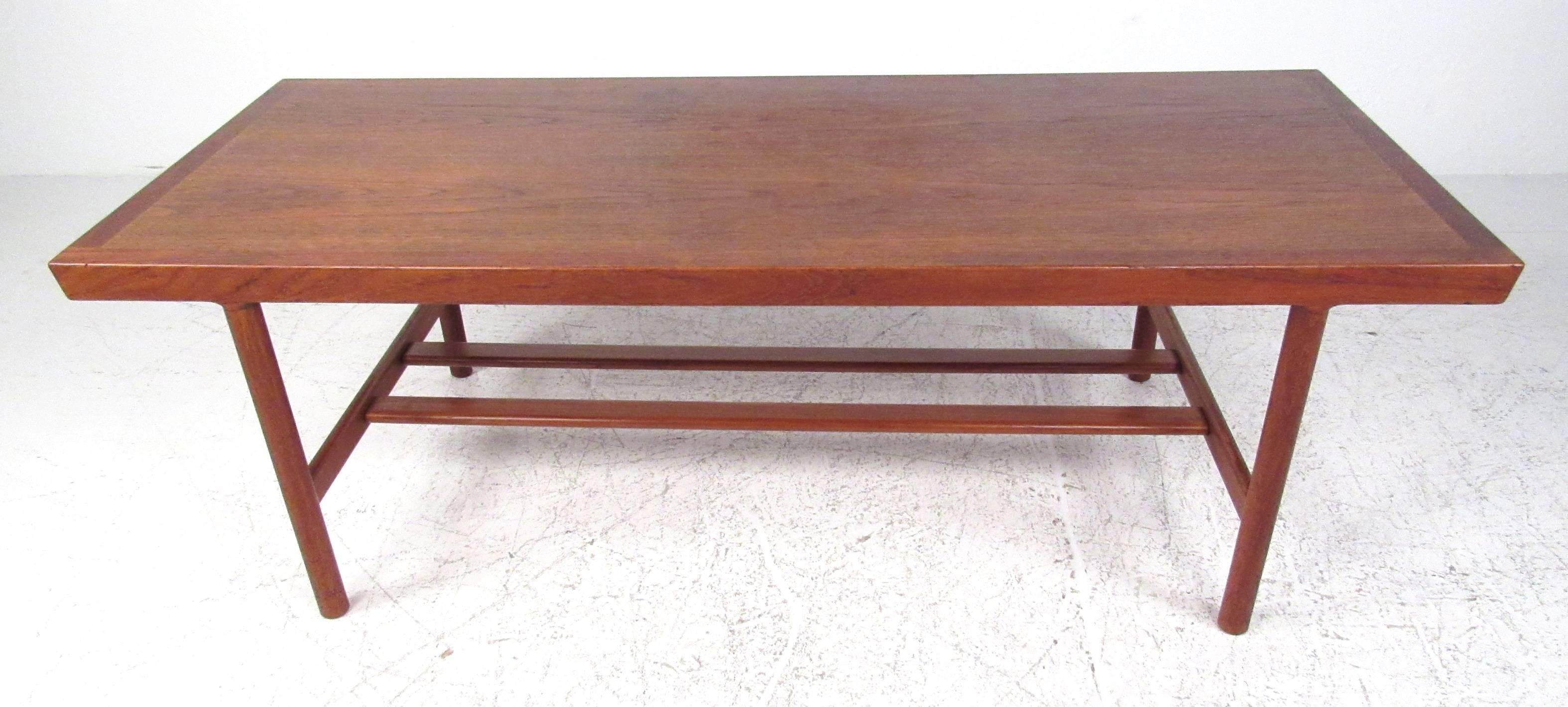 Well constructed Danish modern table with two 16.75