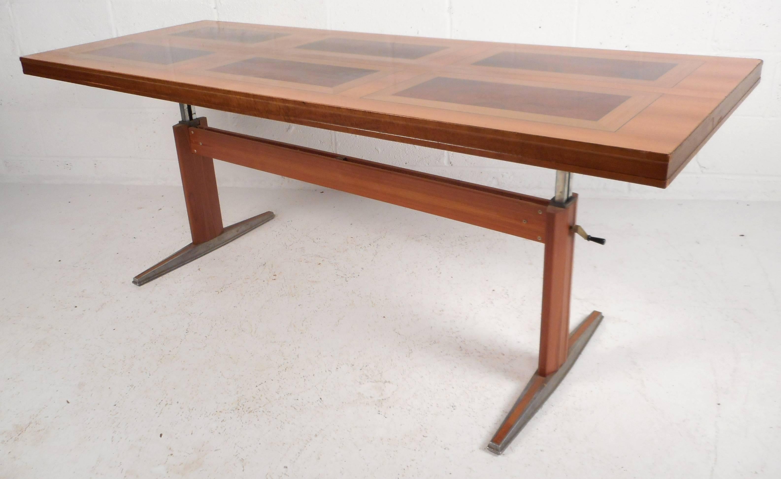 Elegant vintage modern Danish coffee table features the ability to raise all the way to 26.5