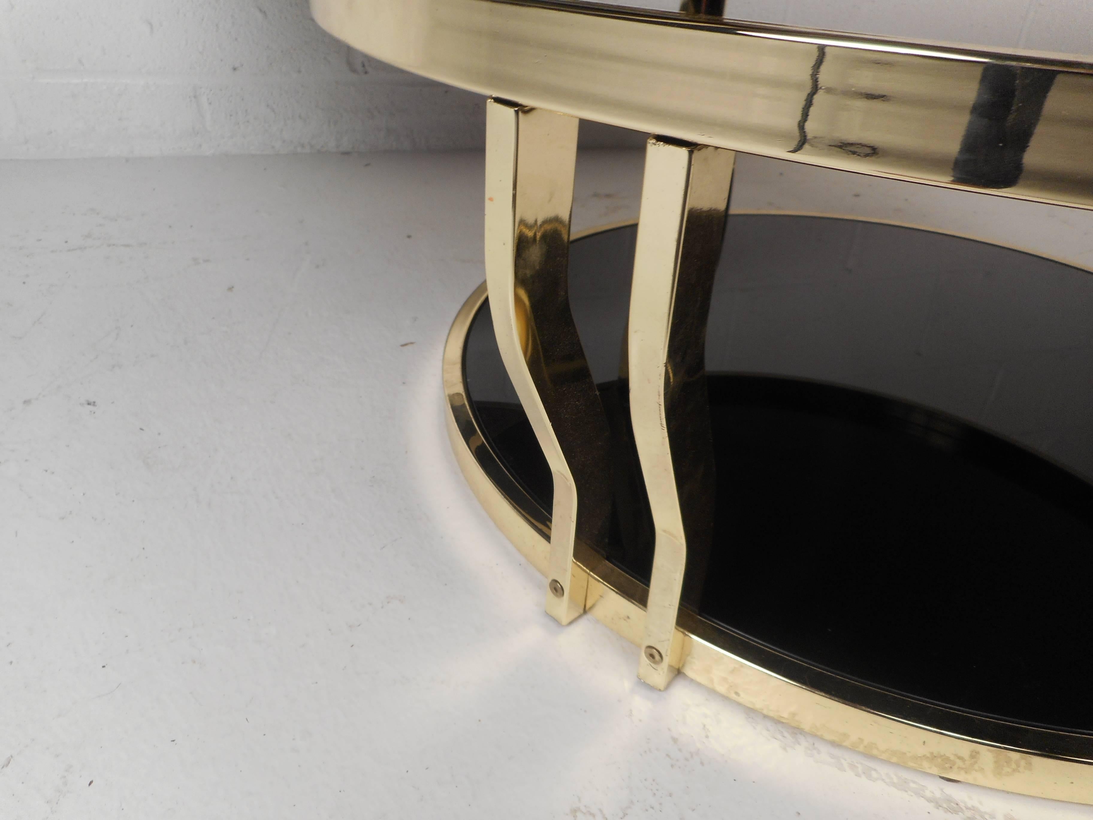 Mid-Century Modern Italian Brass and Smoked Glass Swivel Coffee Table In Good Condition In Brooklyn, NY