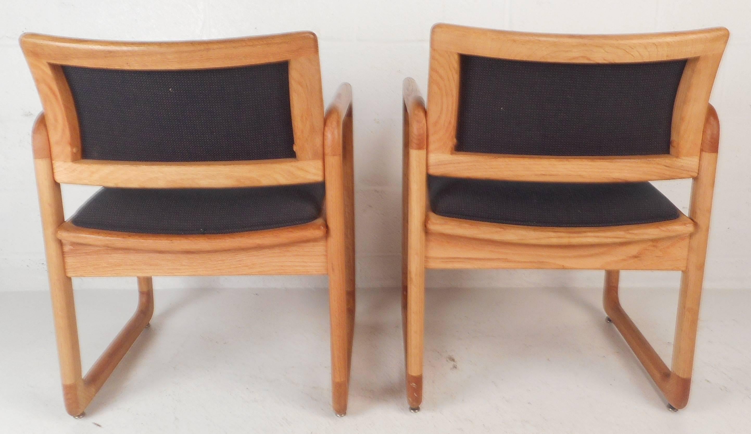 American Pair of Vintage Sculpted Oak Armchairs by Madison Furniture For Sale