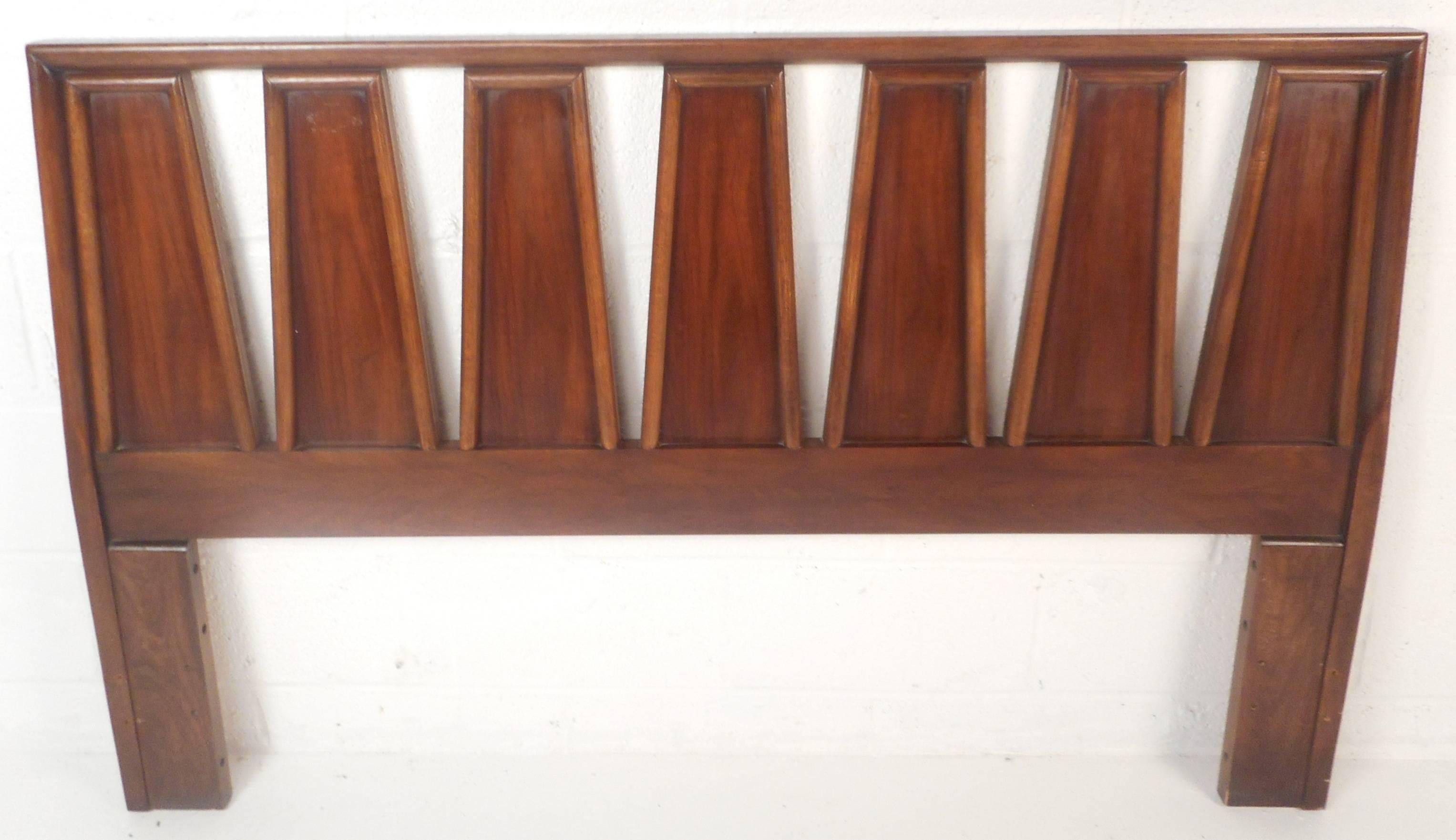 Stunning vintage modern queen-size headboard with unique pattered design and embossed trim. Sleek appearance with beautiful walnut wood grain makes this Mid-Century piece the perfect addition to any modern interior. Please confirm item location (NY
