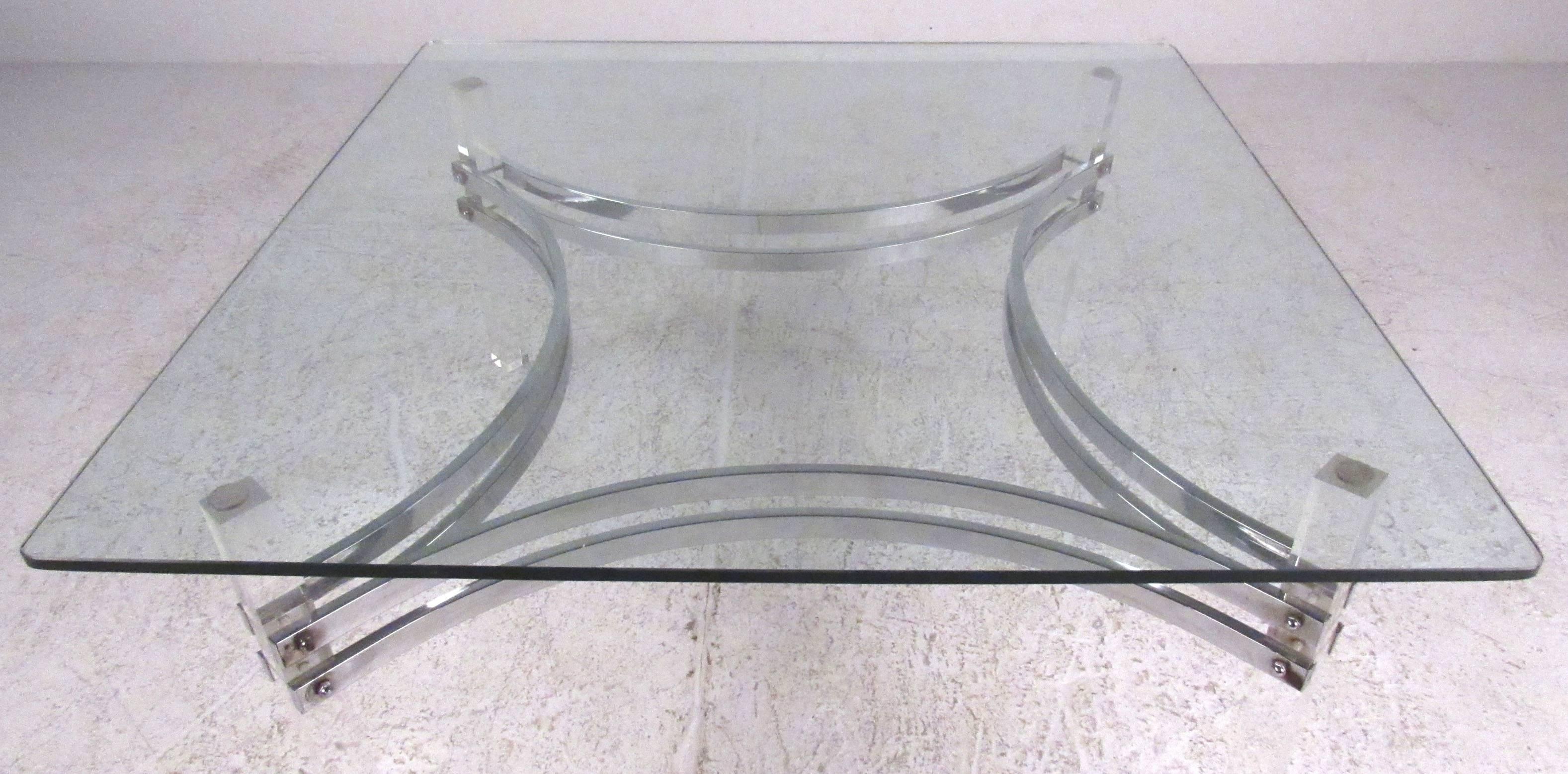 Stylish Mid-Century glass top coffee table with chrome stretchers and solid Lucite legs. A great Mid-Century design that would compliment any modern environment. Please confirm item location (NY or NJ) with dealer.