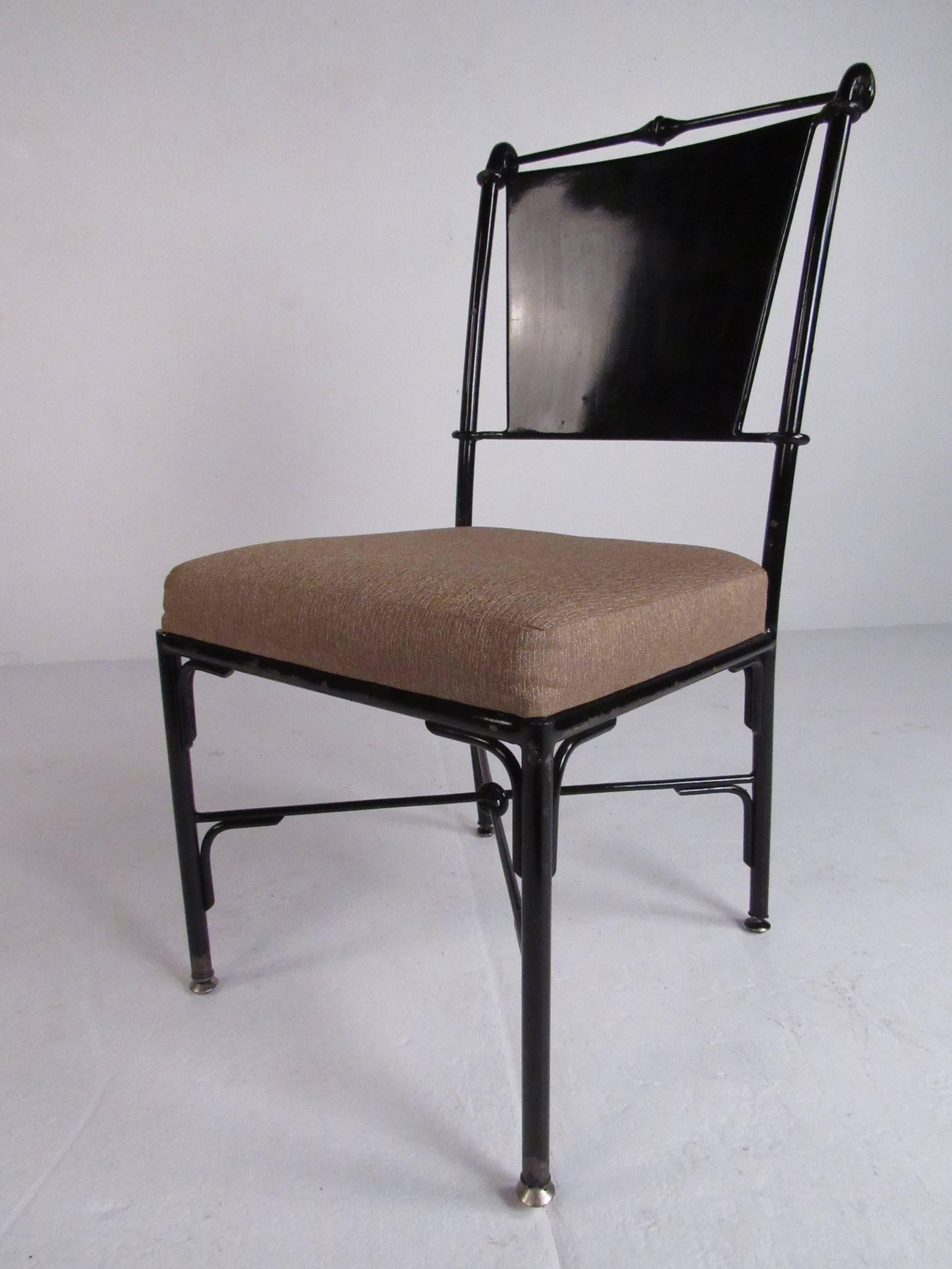 Contemporary style metal dining chairs with glossy black painted finish and upholstered seat. Please confirm item location (NY or NJ) with dealer.