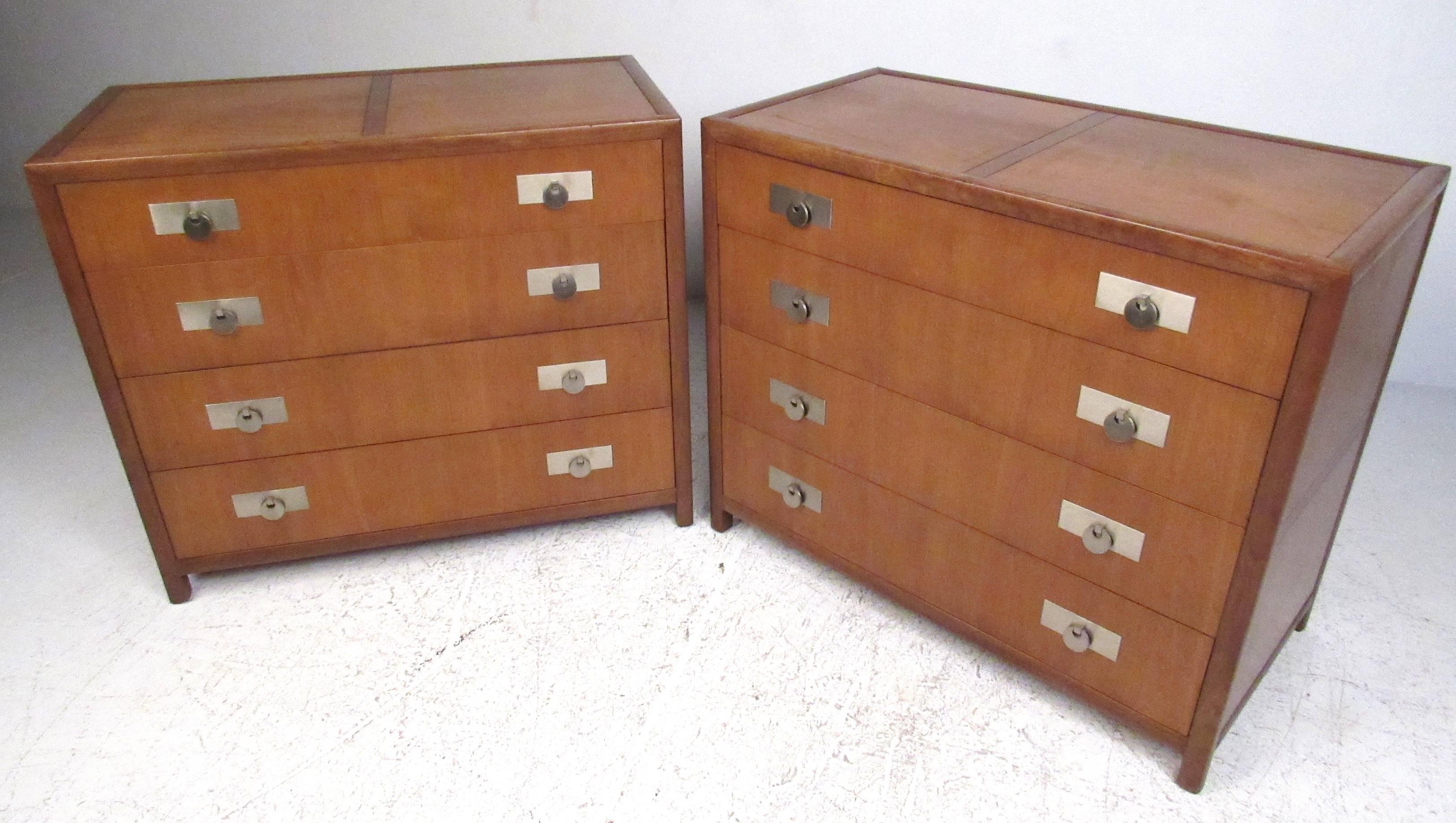 Beautifully detailed matching pair of four drawer dressers by Michael Taylor for Baker, New World collection. Stunning finish and spacious drawers add to the vintage modern appeal of this exquisite pair of bachelor chests. Please confirm item