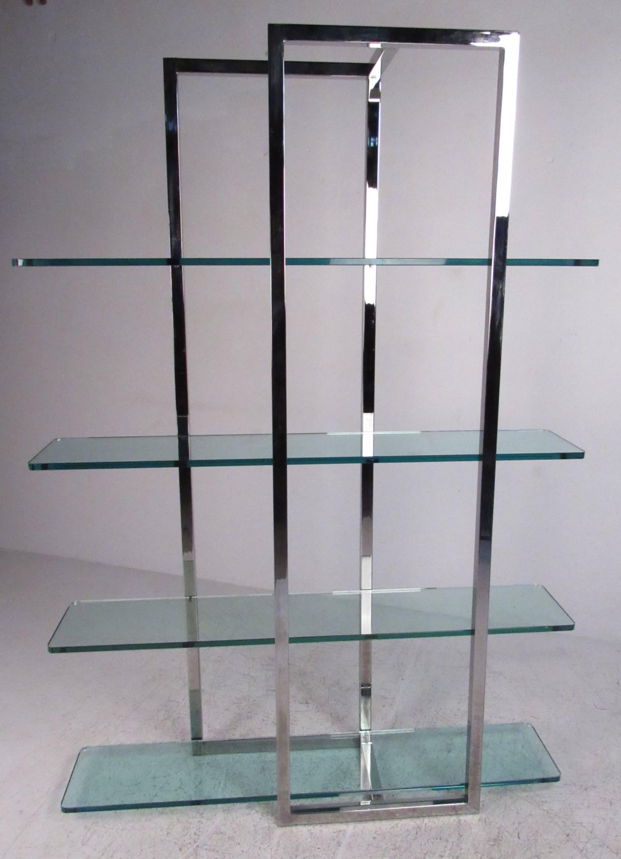 Heavy duty square-tube chrome frame with 3/4" thick glass shelves creates an impressive contemporary display unit for home or office. Item preview and pickup: 1315 Hwy. 34, Wall Township, NJ, 07727.