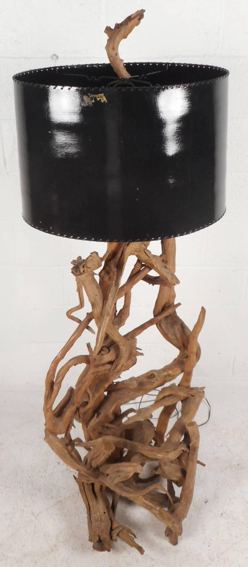This beautiful vintage modern floor lamp is made of driftwood with many twists and turns throughout. Unique design shows intricate detail and quality craftsmanship. This stylish and sturdy piece makes the perfect eye catching addition to any modern