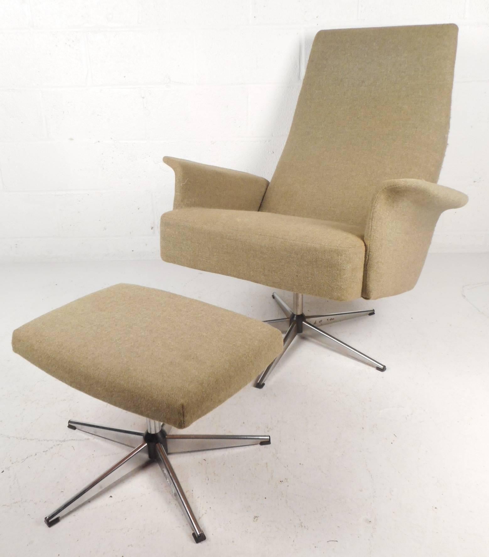 This impressive vintage modern lounge chair and ottoman features unusual winged arm rests ensuring maximum comfort without sacrificing style. Beautiful plush light green upholstery, a chrome swivel base, and a high backrest add to the allure. Sleek