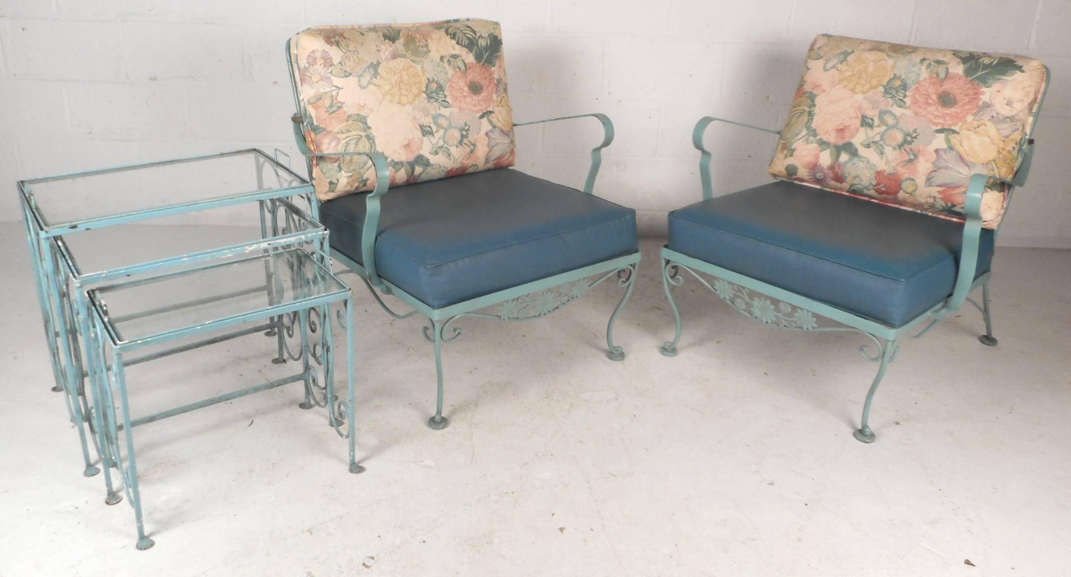 This stunning vintage modern patio set includes: four lounge chairs, an ottoman, an end table, three nesting tables, a dining table and six chairs. Two lounge chairs combine to form a stylish settee adding to the allure. Impressive bent iron rod