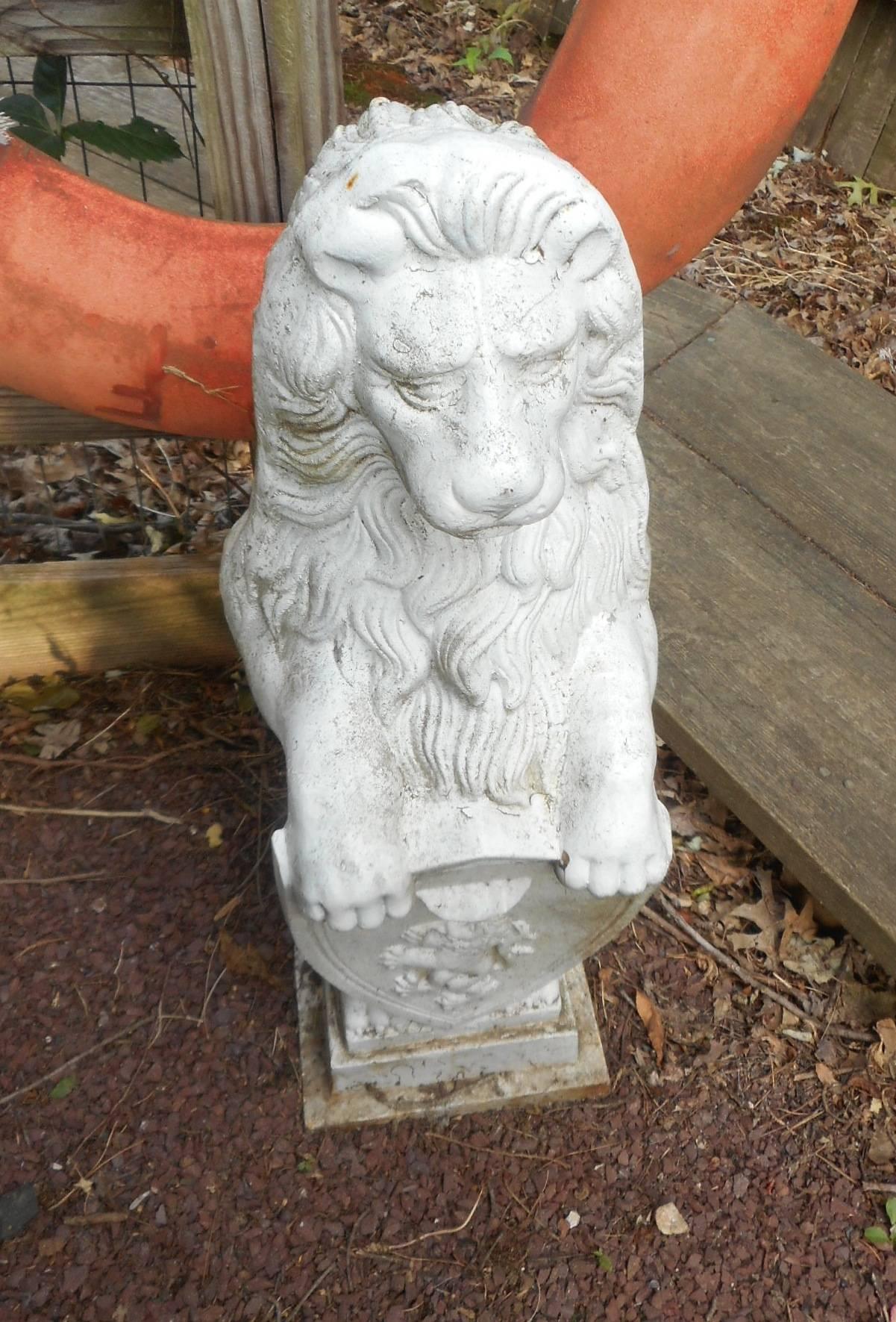 lion with shield statue