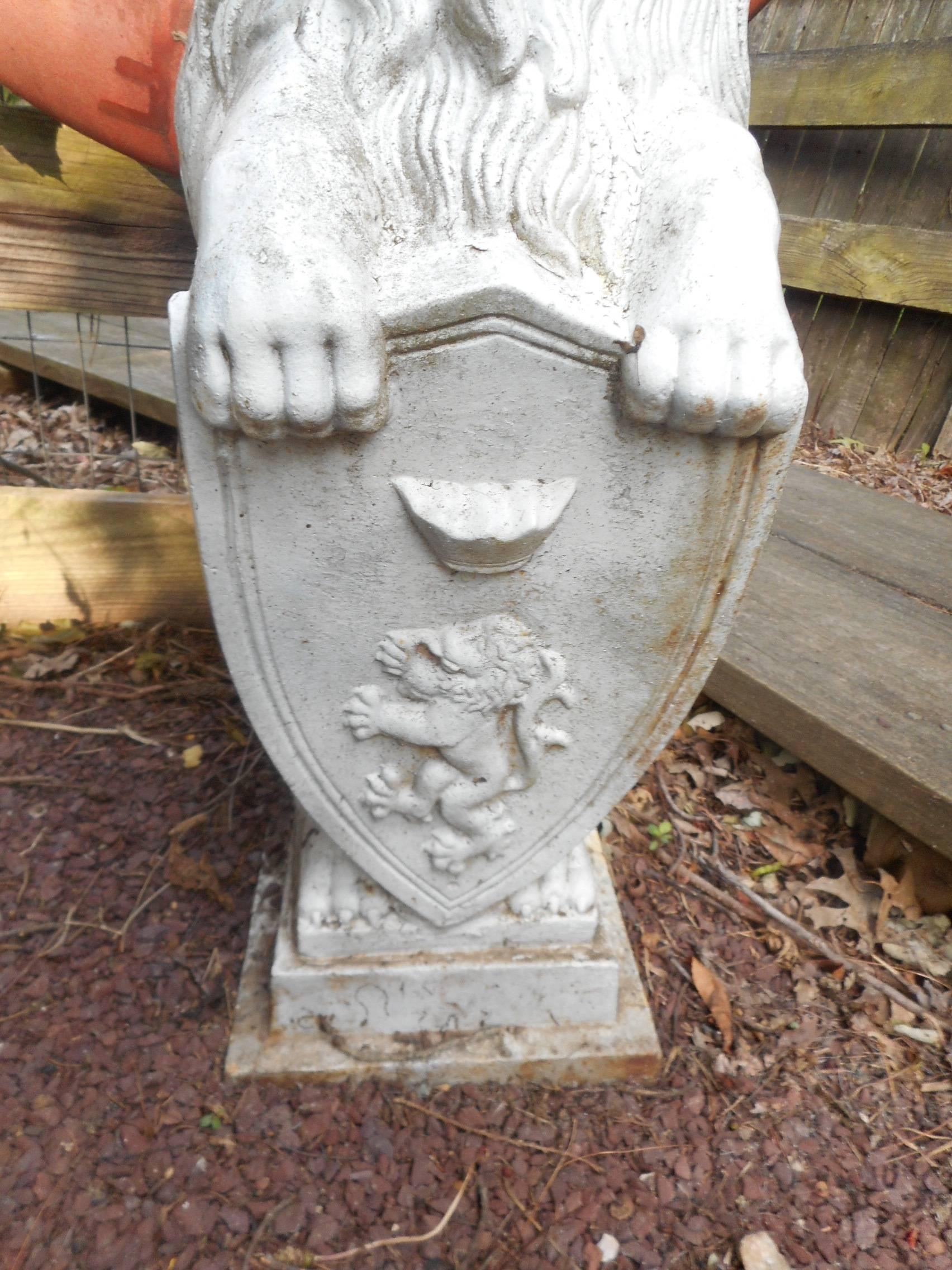 Pair of Cast Iron Lion Statues Holding a Shield For Sale at 1stDibs lion with shield statue