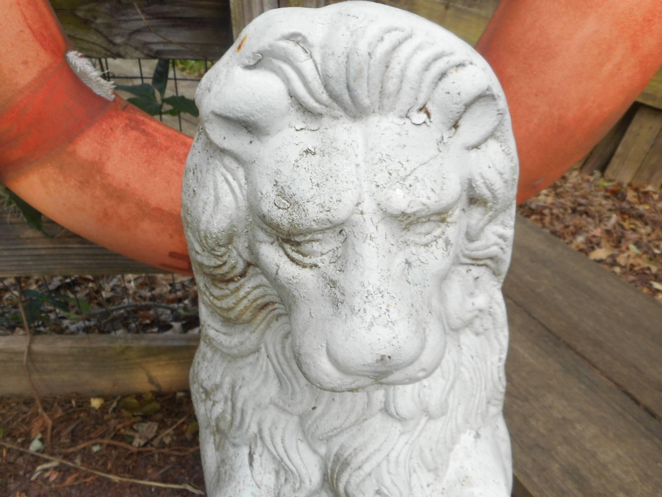 concrete lion statues pair