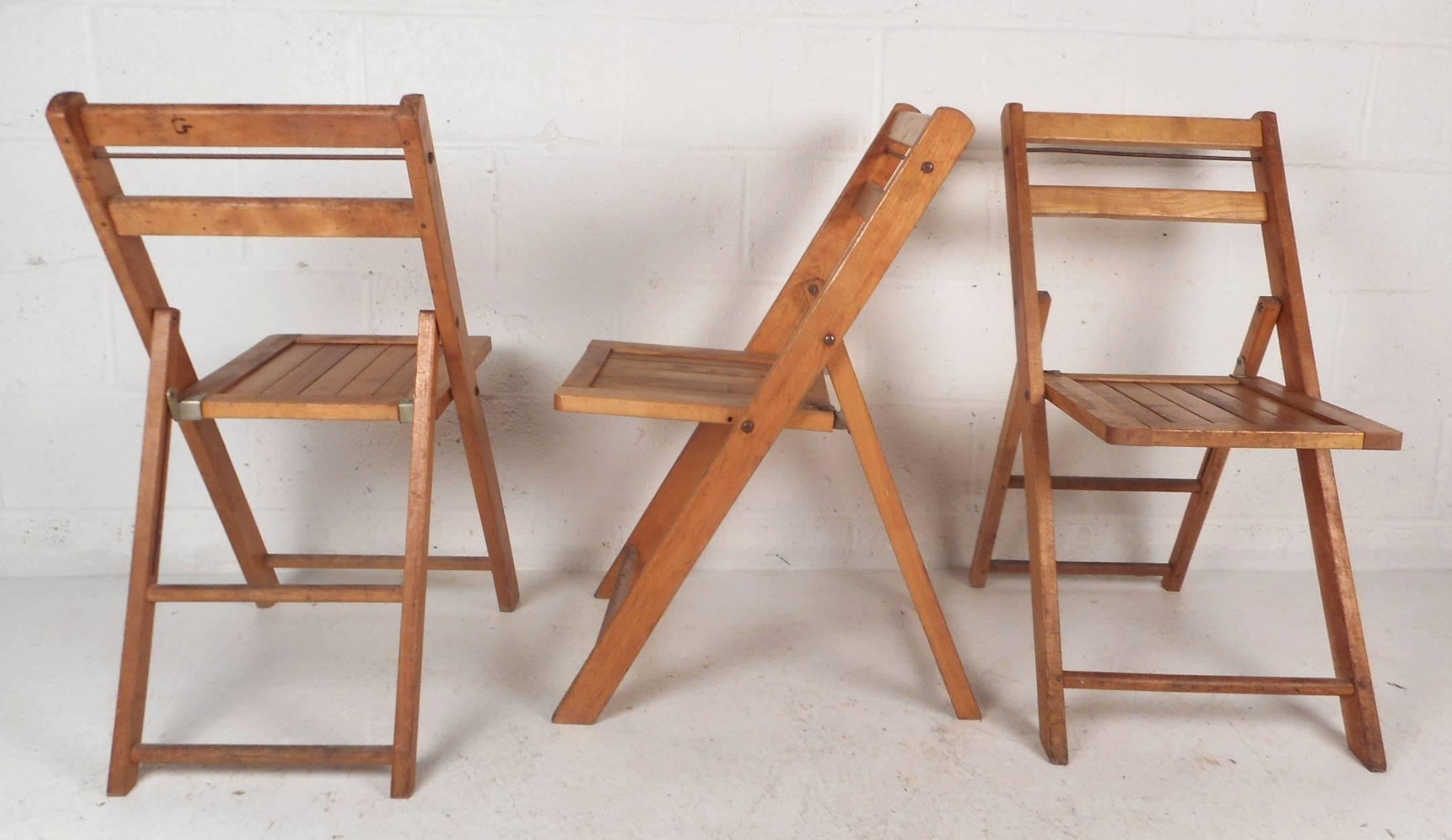 ***Each chair is being sold individually***

Stylish Mid-Century Modern collapsible chairs with slatted seats and angled legs. These beautiful hall chairs are extremely comfortable with the convenience of easy storage. The solid blonde colored wood