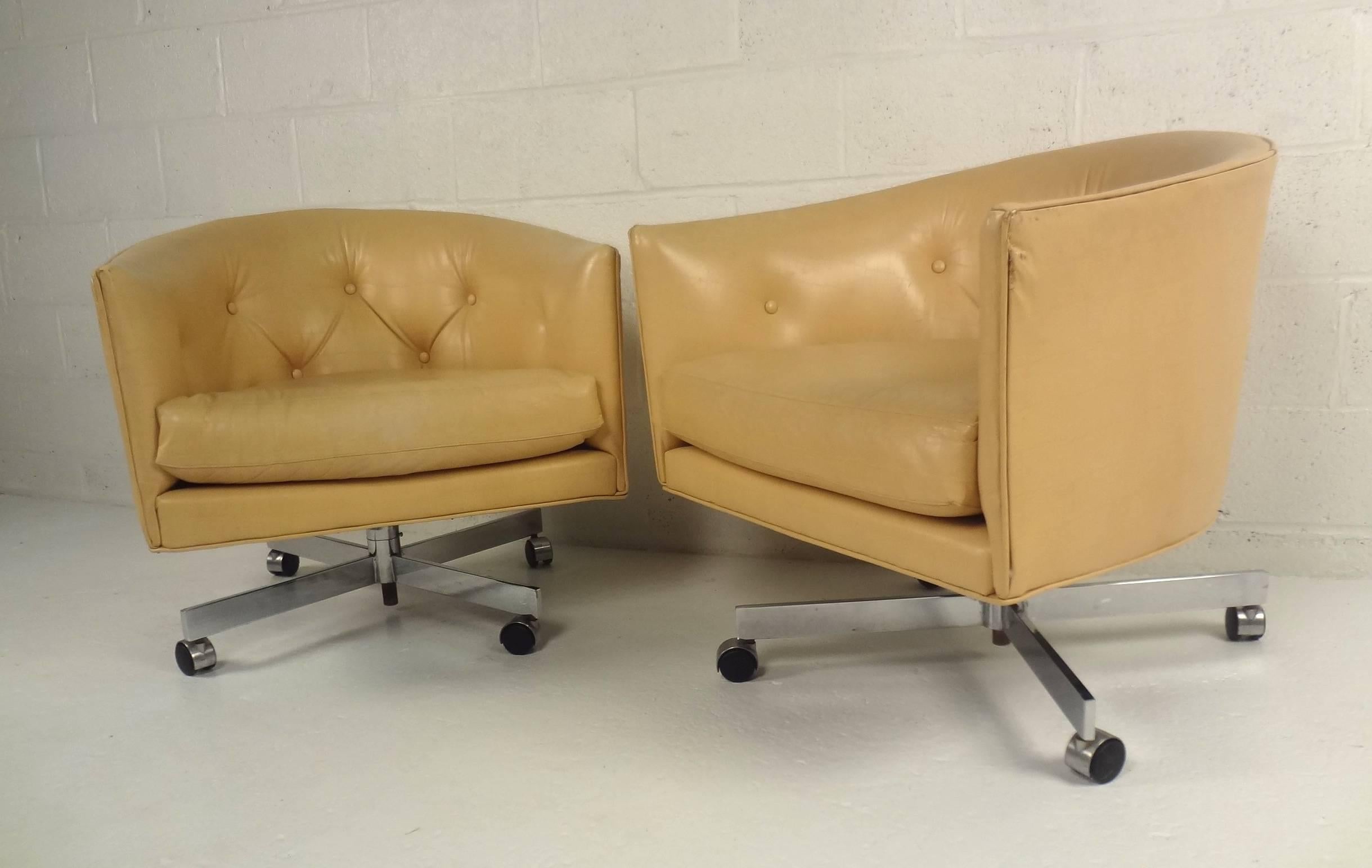 American Pair of Tufted Naugahyde Swivel Chairs by Milo Baughman For Sale