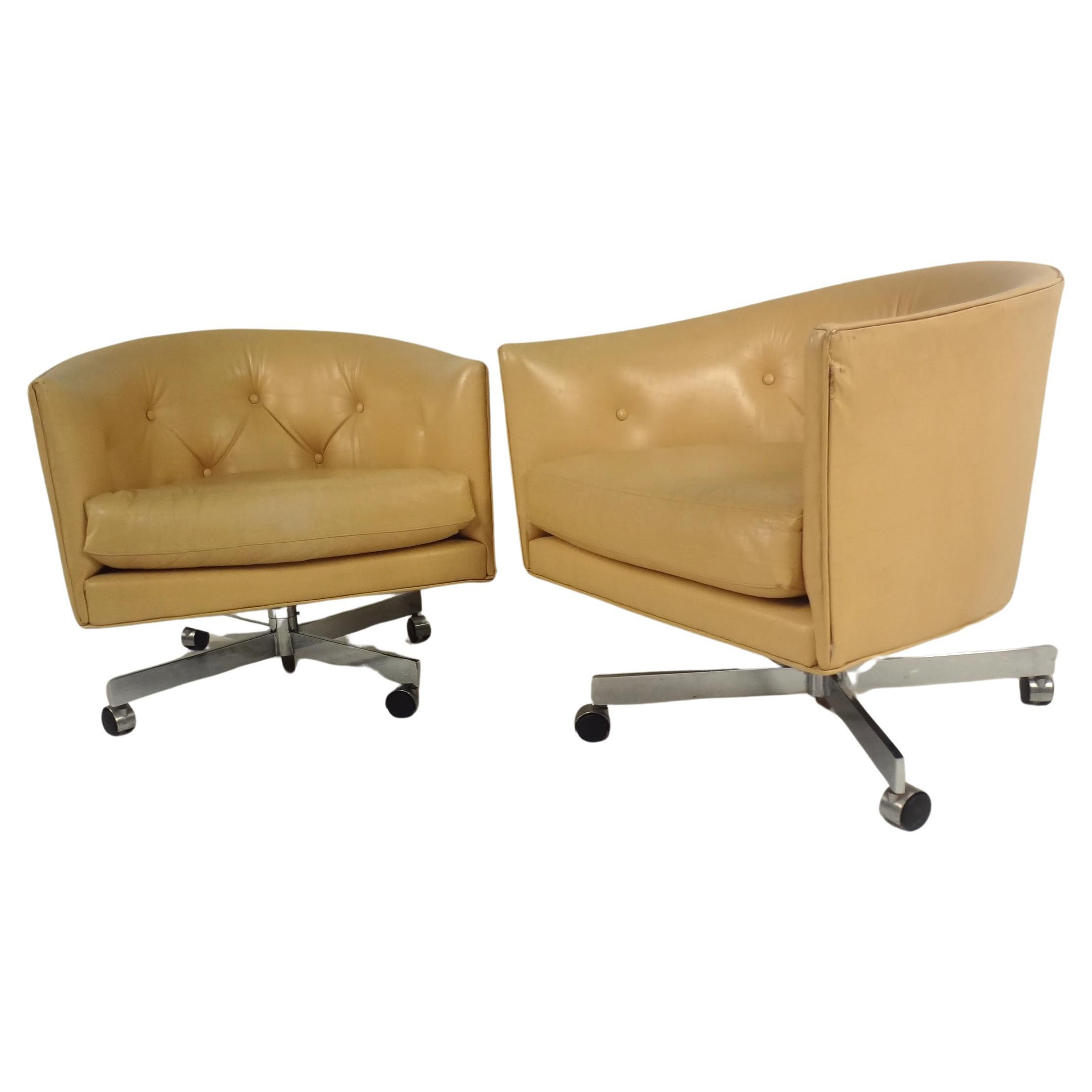 Pair of Tufted Naugahyde Swivel Chairs by Milo Baughman