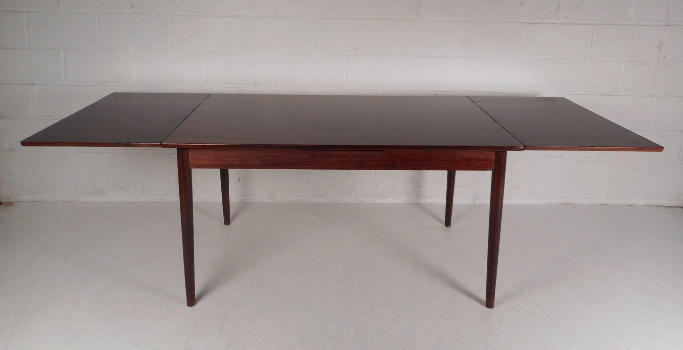 Danish Mid-Century Modern Rosewood Draw Leaf Dining Table by Edmund Jorgensen