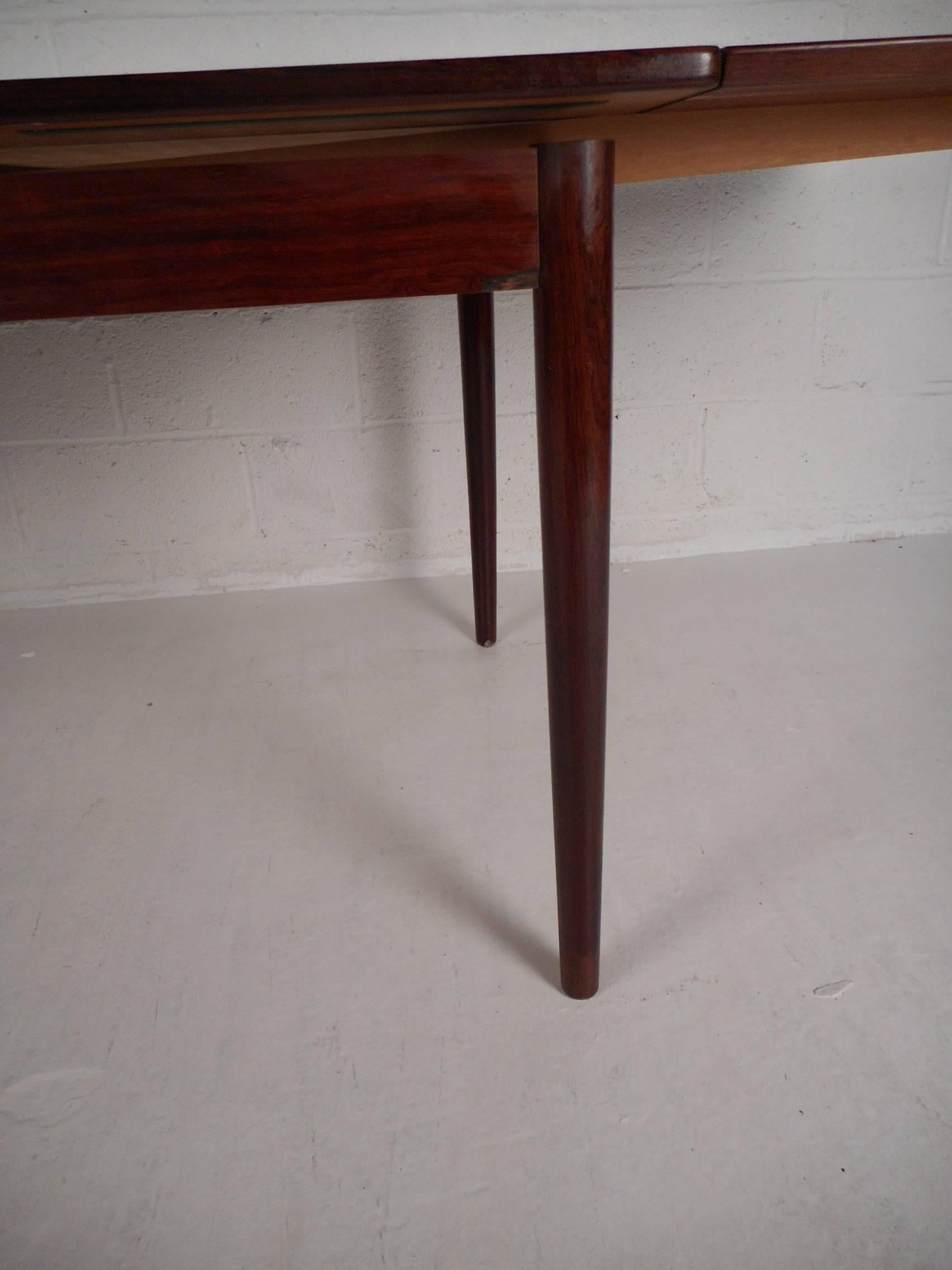 Late 20th Century Mid-Century Modern Rosewood Draw Leaf Dining Table by Edmund Jorgensen