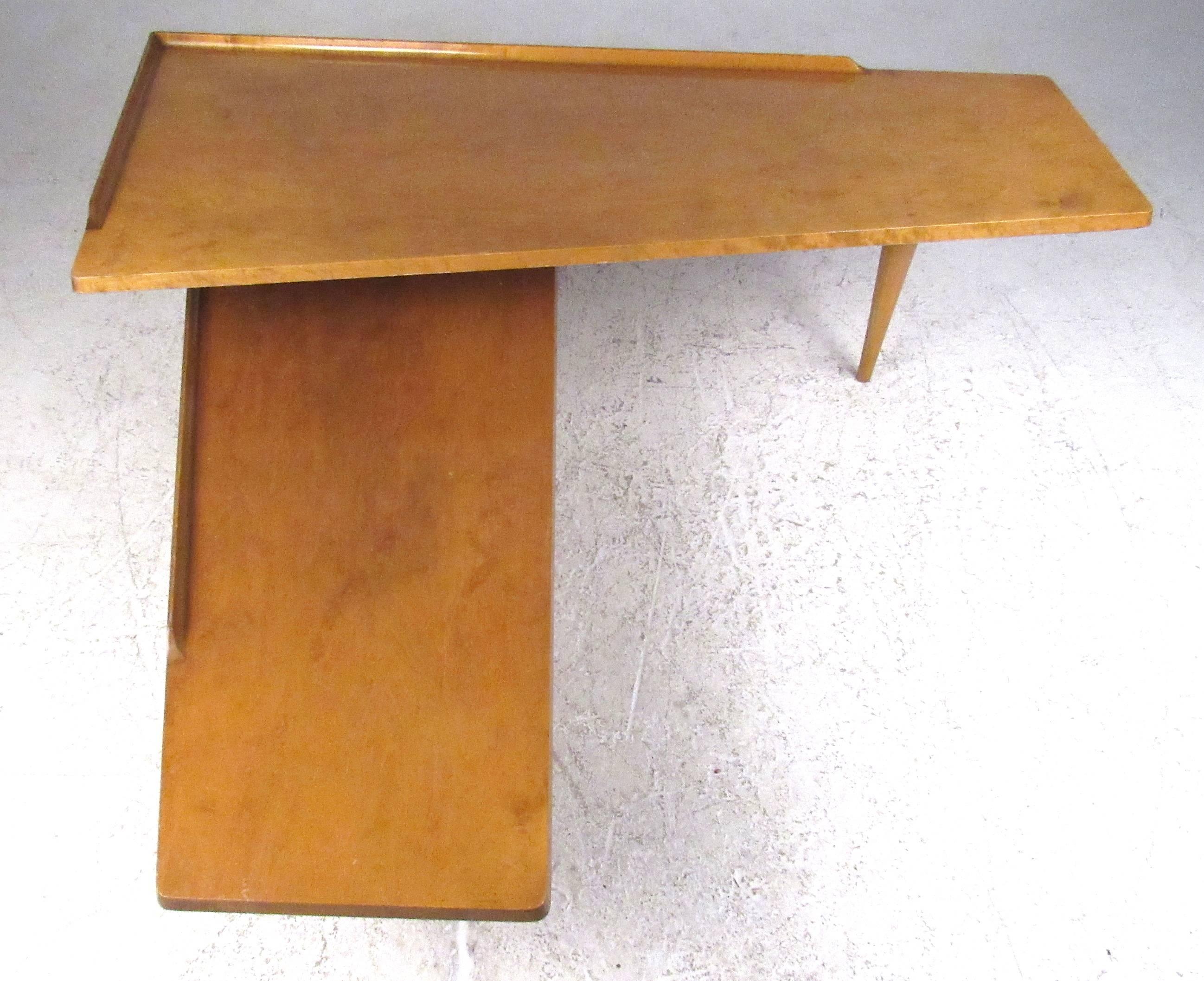 Table basse pivotante unique en son genre, dotée de deux hauteurs de table 11