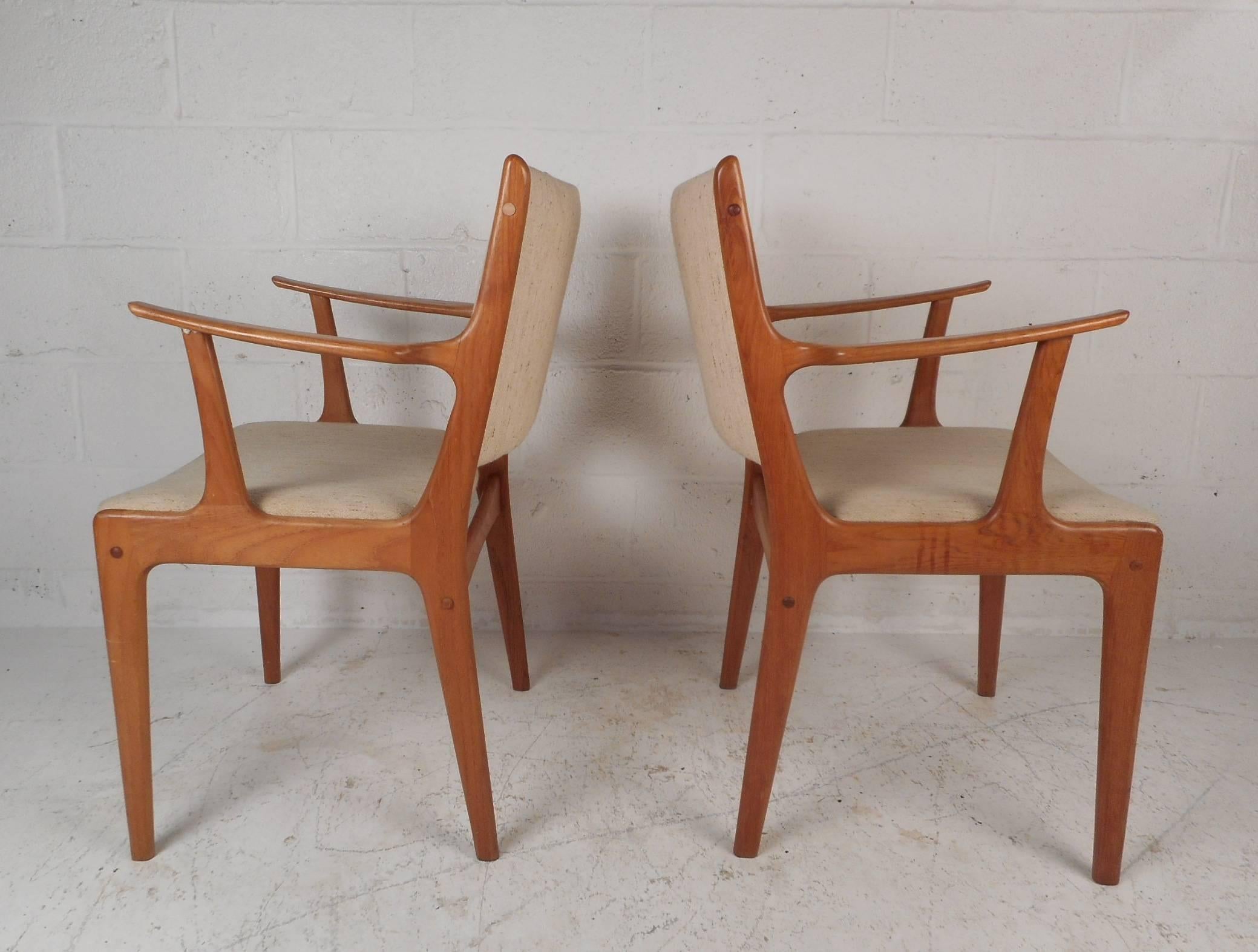 Beautiful Pair of Mid-Century Modern Danish Teak Arm Dining Chairs In Good Condition In Brooklyn, NY
