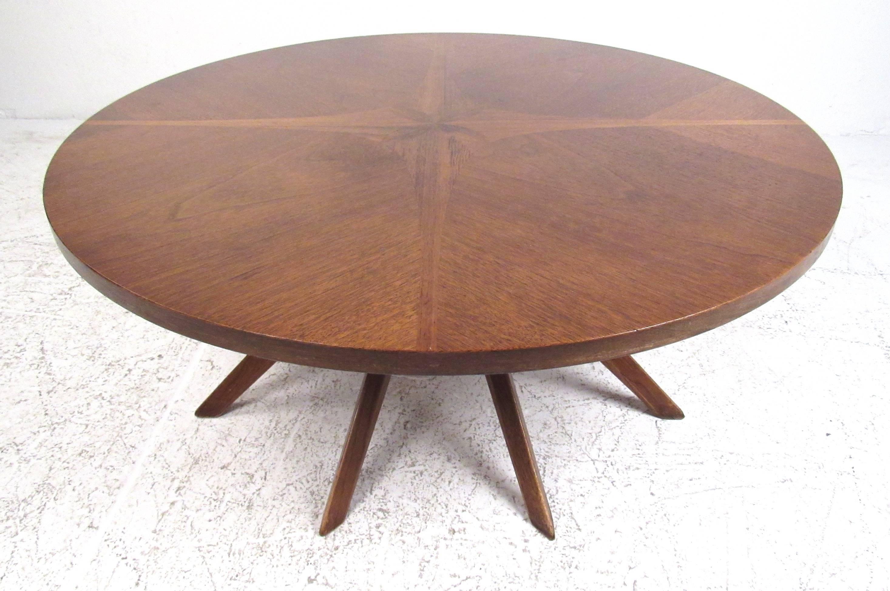 Rare Broyhill Brasilia Cathedral coffee table, 1962, with decorative inlay walnut top supported by sculptural splayed legs. Please confirm item location (NY or NJ) with dealer.
 