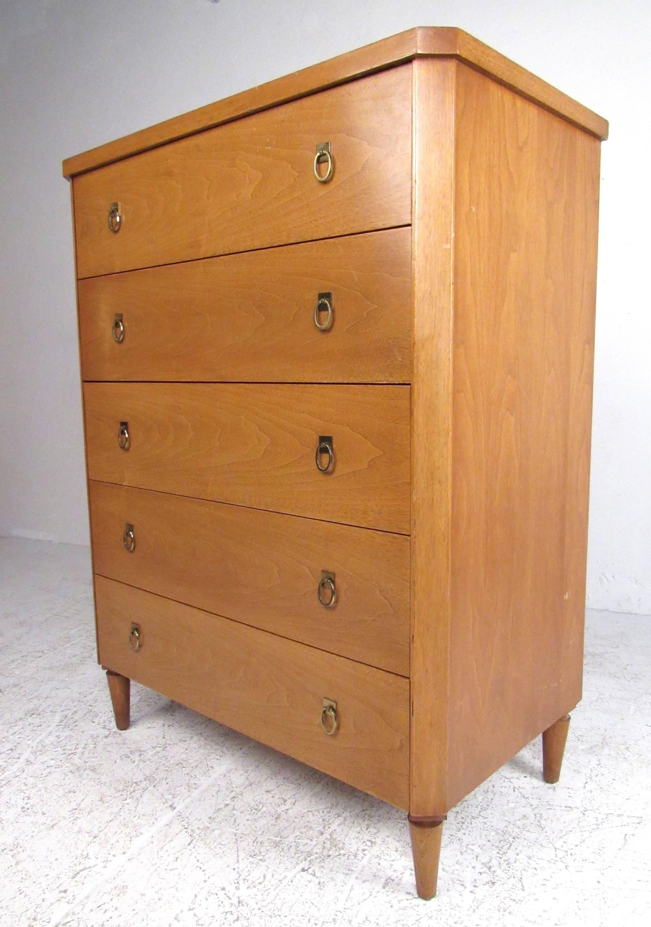 Pair of Mid-Century Modern walnut dressers designed by T.H. Robsjohn-Gibbings for Widdicomb. Long, low six-drawer dresser with four partitioned drawers (removable), and matching five drawer highboy. These are well constructed cabinets with oak
