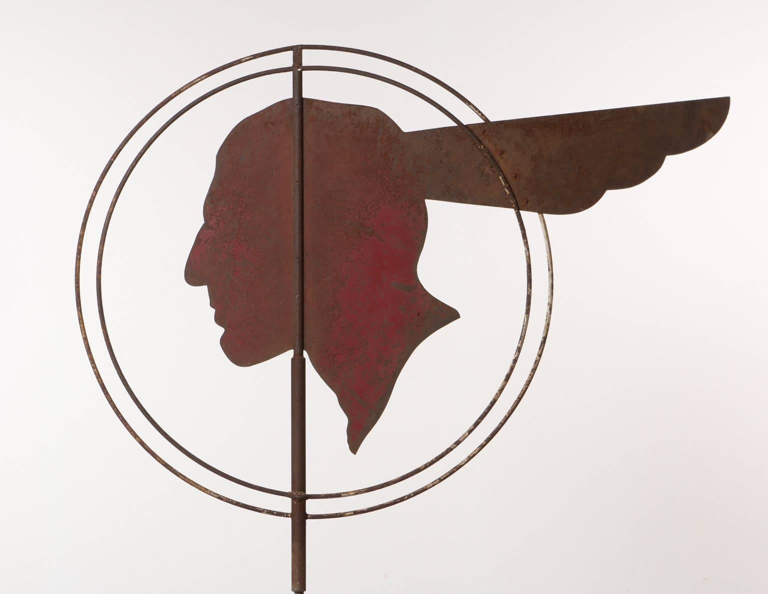 This all original 1930s Pontiac Indian head weathervane once stood atop a Pontiac car dealership roof directing customers to the products below. This weathervane has wonderful natural patina that shows decades of natural outdoor use. The head itself