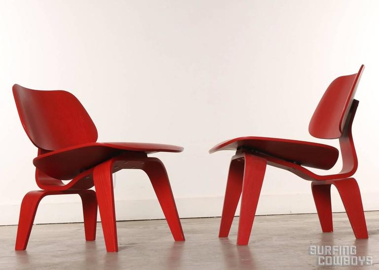 Pair Of Red Eames Molded Plywood Lounge Chair Lcw At 1stdibs