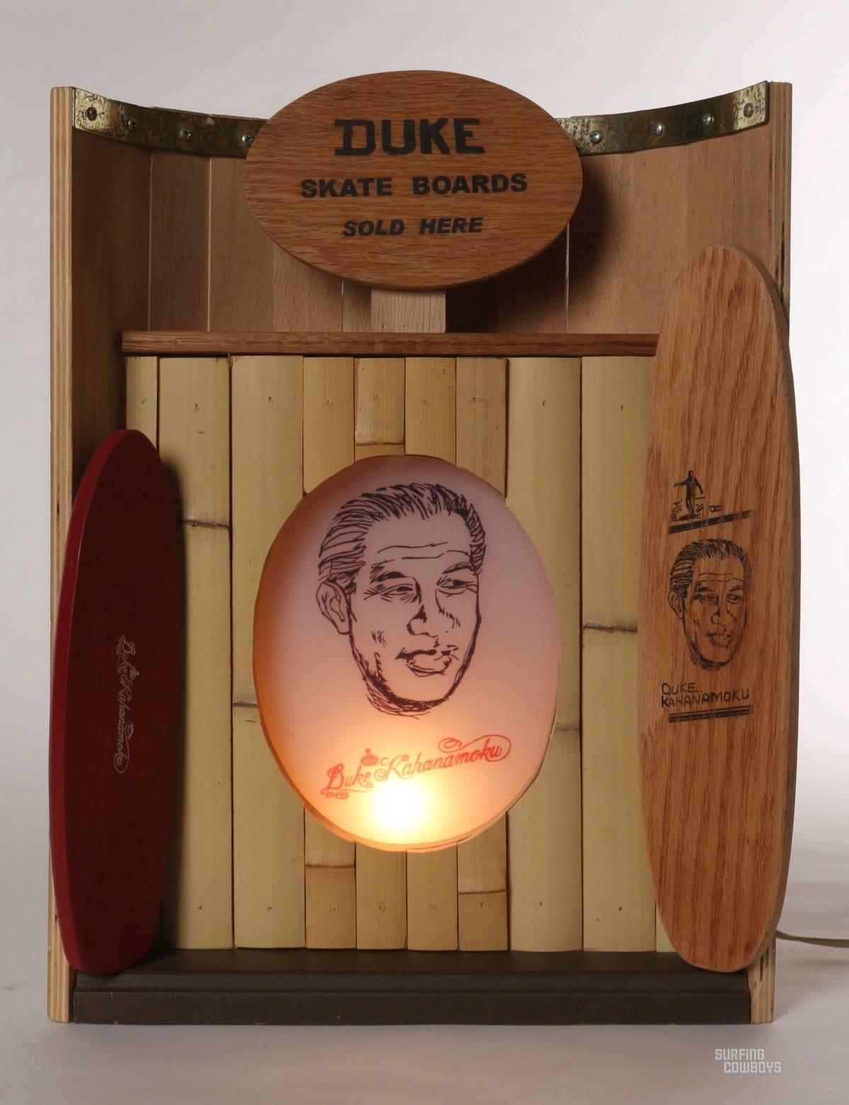 Very few of these Duke Kahanamoku skateboard point of sale display lamps were ever made, making this a classic and exceptionally rare piece of Duke Kahanamoku memorabilia. Standing 18 inches tall and 14 inches wide, with an illuminated center