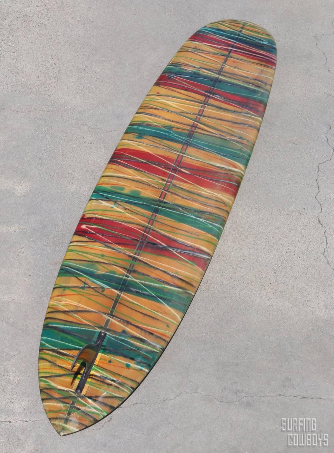 Late 1960s acid splashed Bing Pintail with clear deck, clear bright logo
and beautifully painted acid splash rails and bottom. Both deck and bottom are equally striking making this a perfect board to float centrally in a space, displaying with both