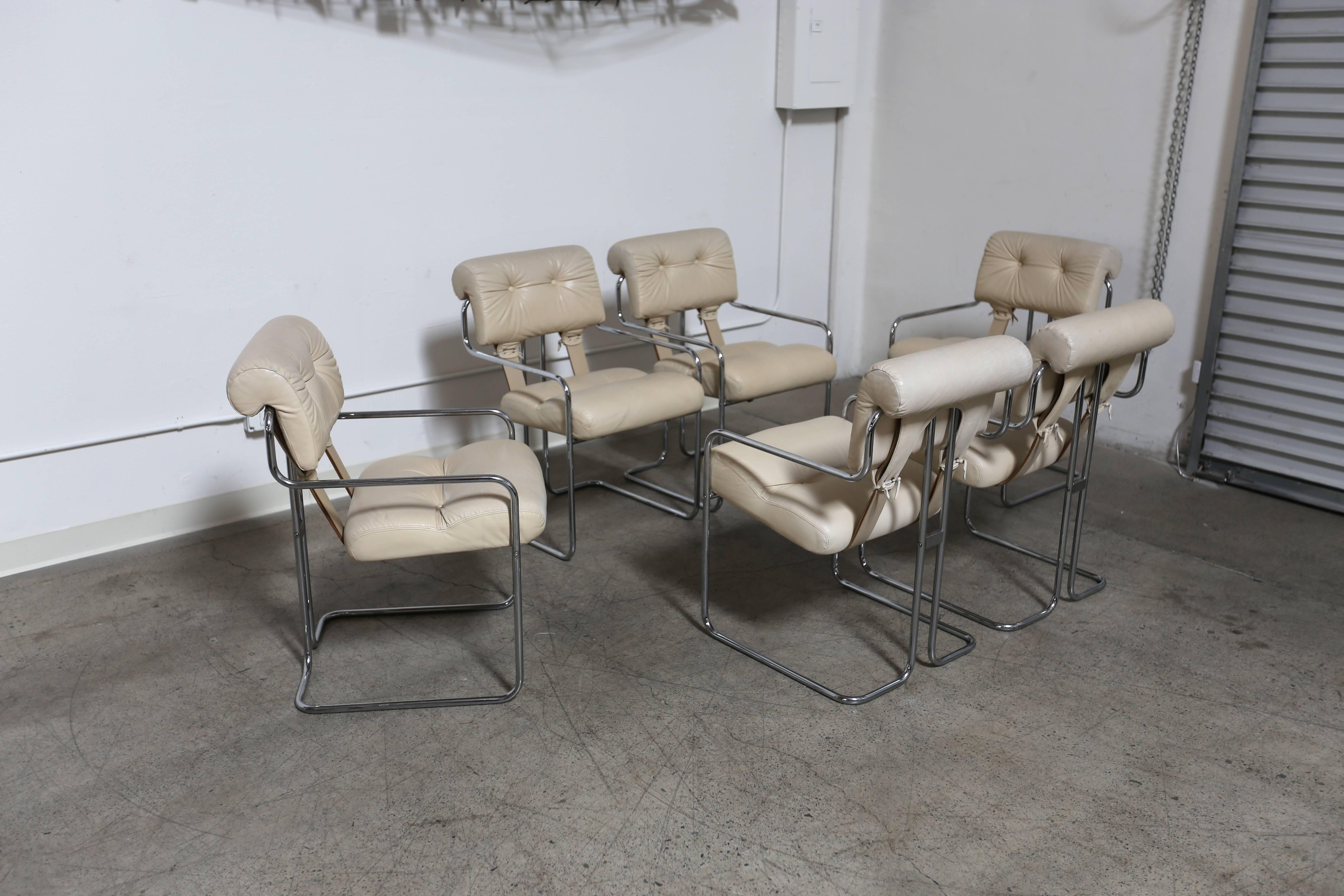 Set of six Guido Faleschini "Tucroma" dining chairs by i4 Mariani for Pace. This seat retains its original cream leather.