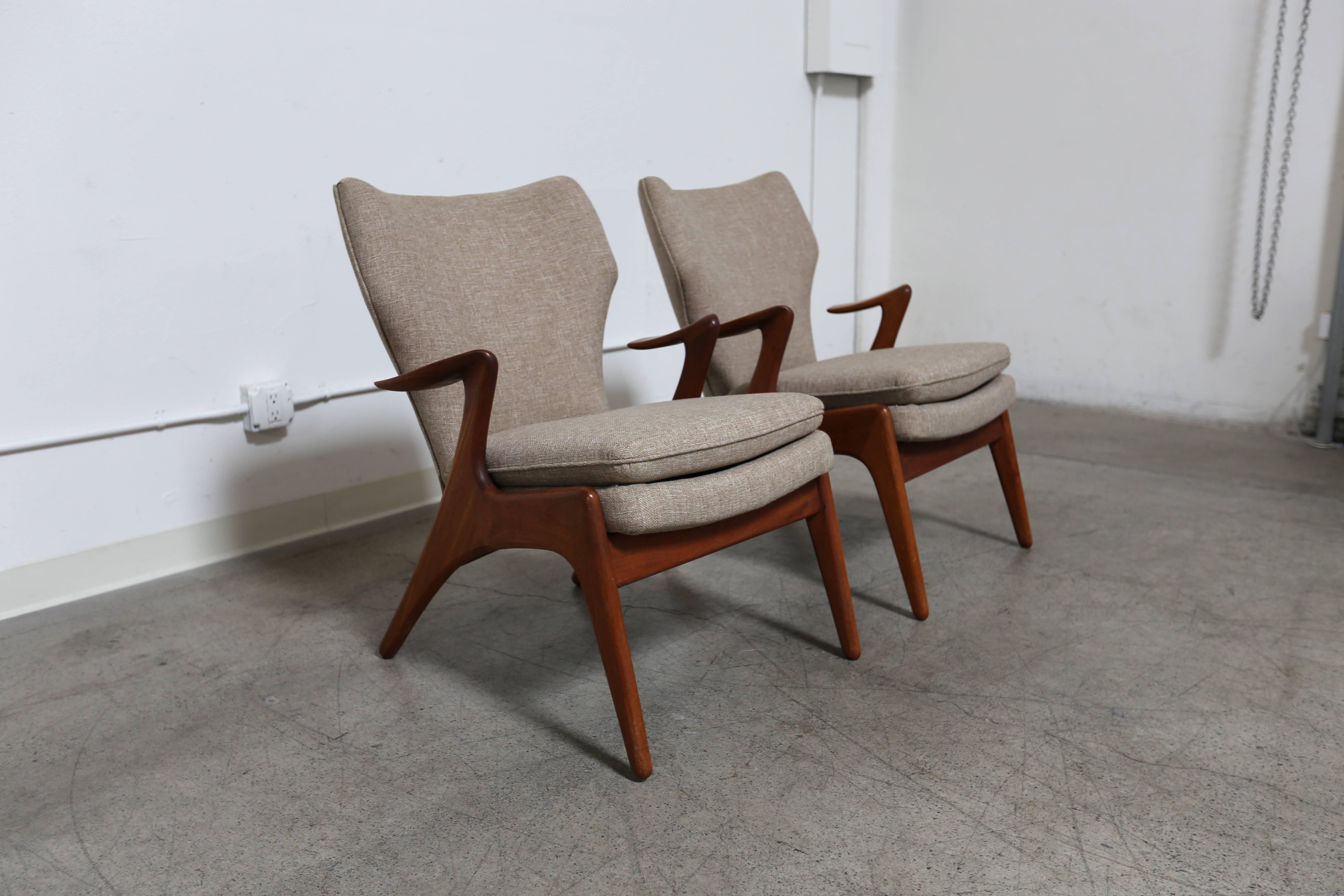 Pair of sculptural teak lounge chairs by Glostrup Mobelfabrik. 