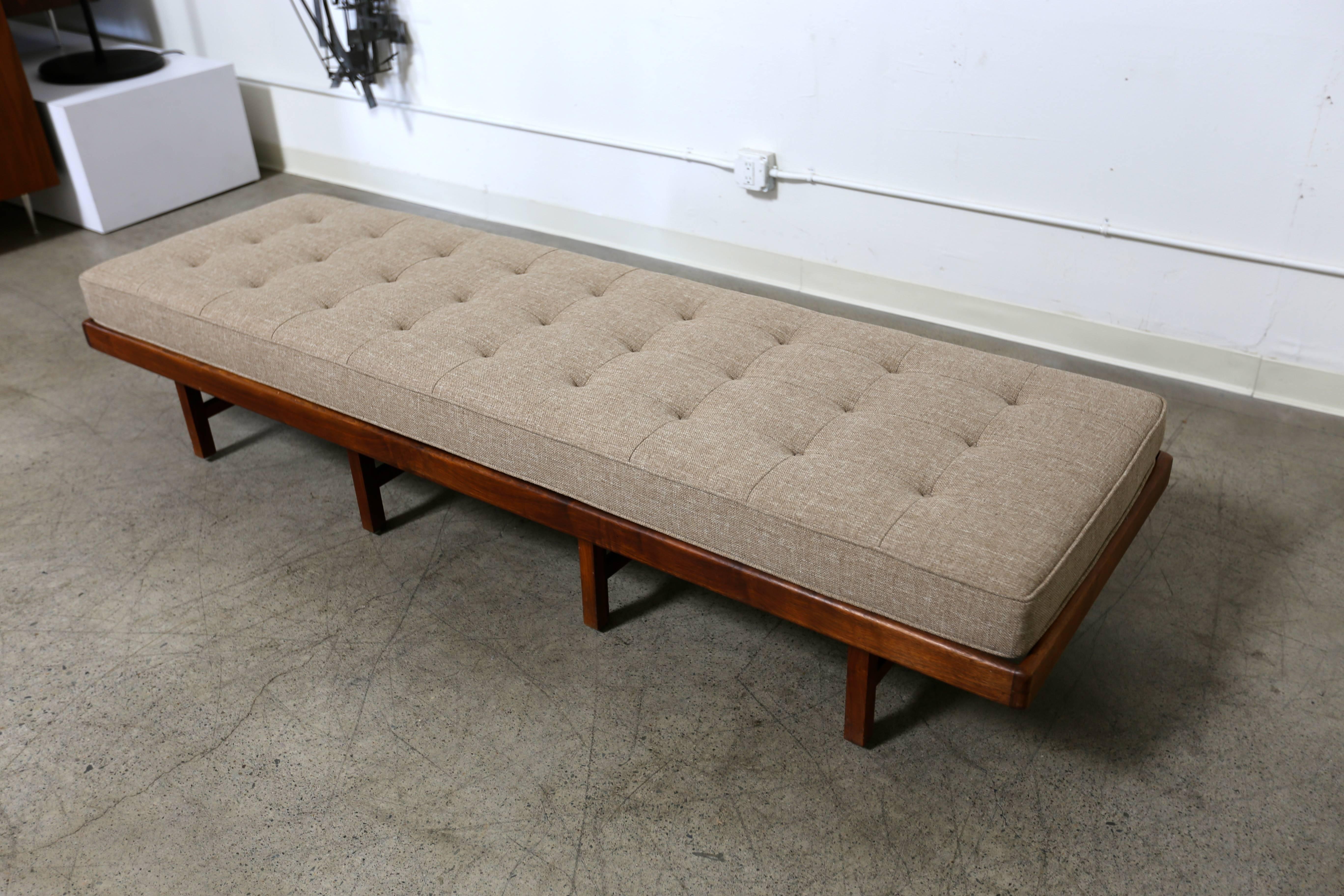 Studio crafted solid walnut bench with a tweed cushion.