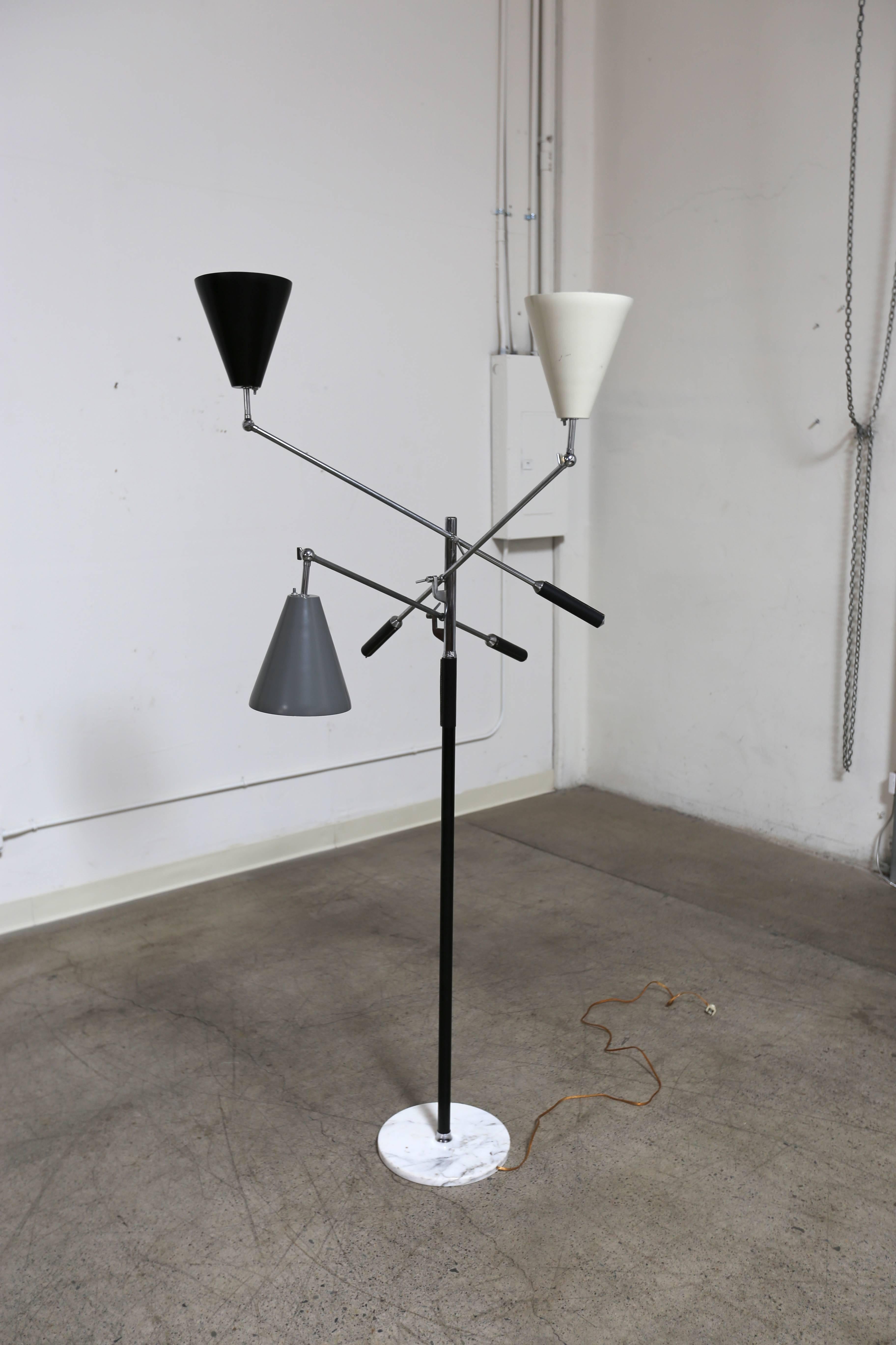 Italian Triennale floor lamp. This is a fine vintage example stamped made in Italy.