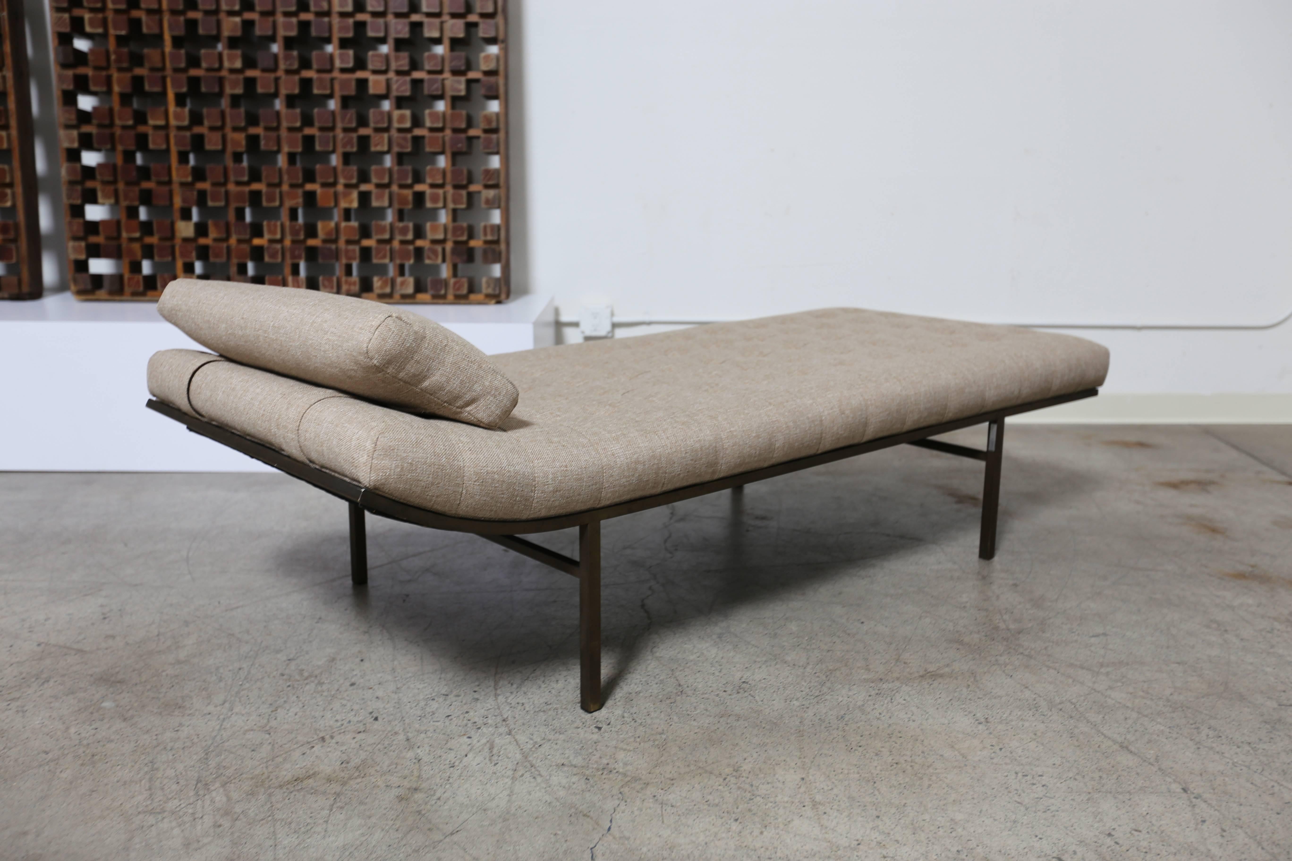 Tufted bronze finished chaise longue by Jules Heumann.