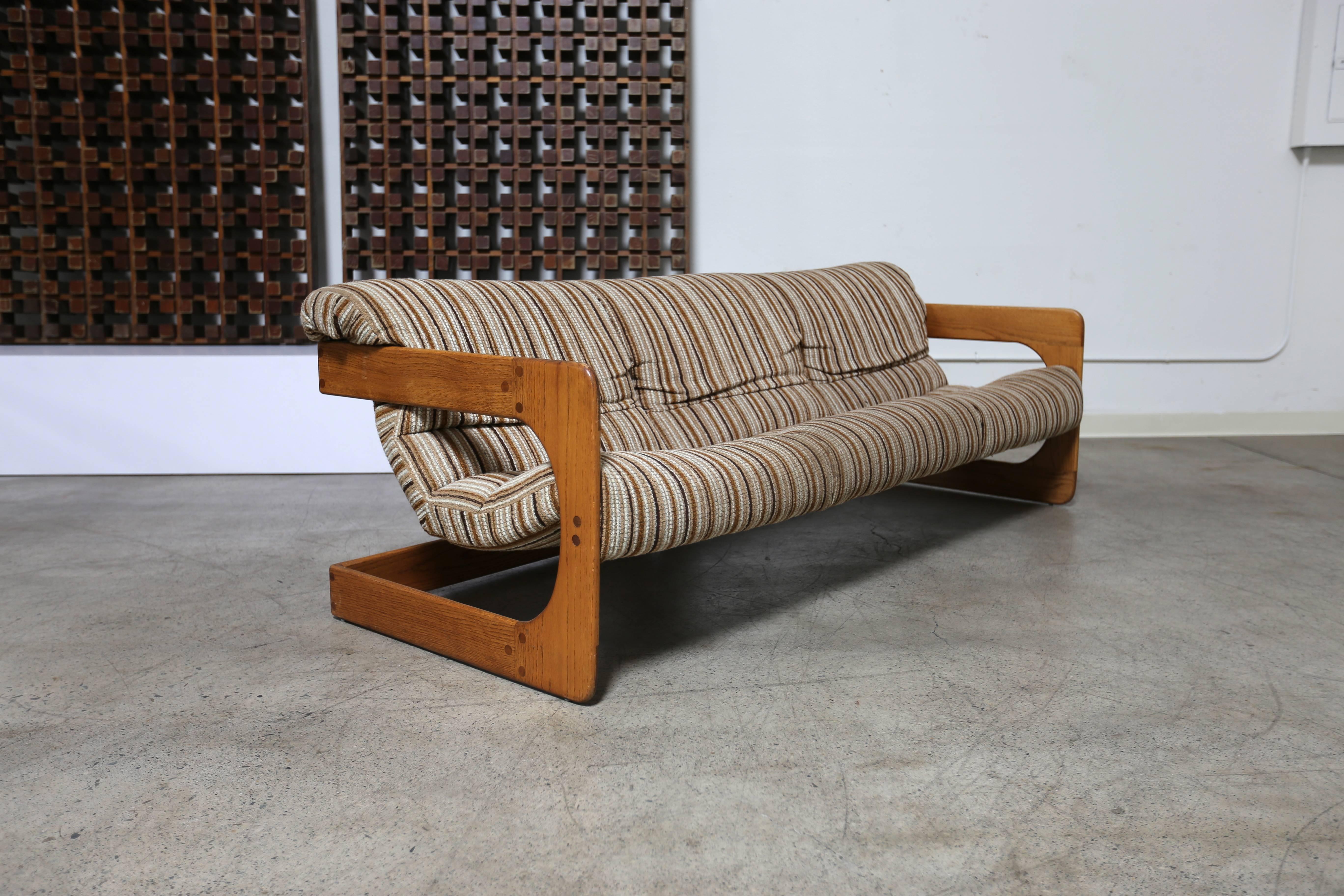 Solid oak sofa by Lou Hodges for California Design Group.