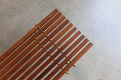 Walnut and Brass Slat Bench by Hugh Acton