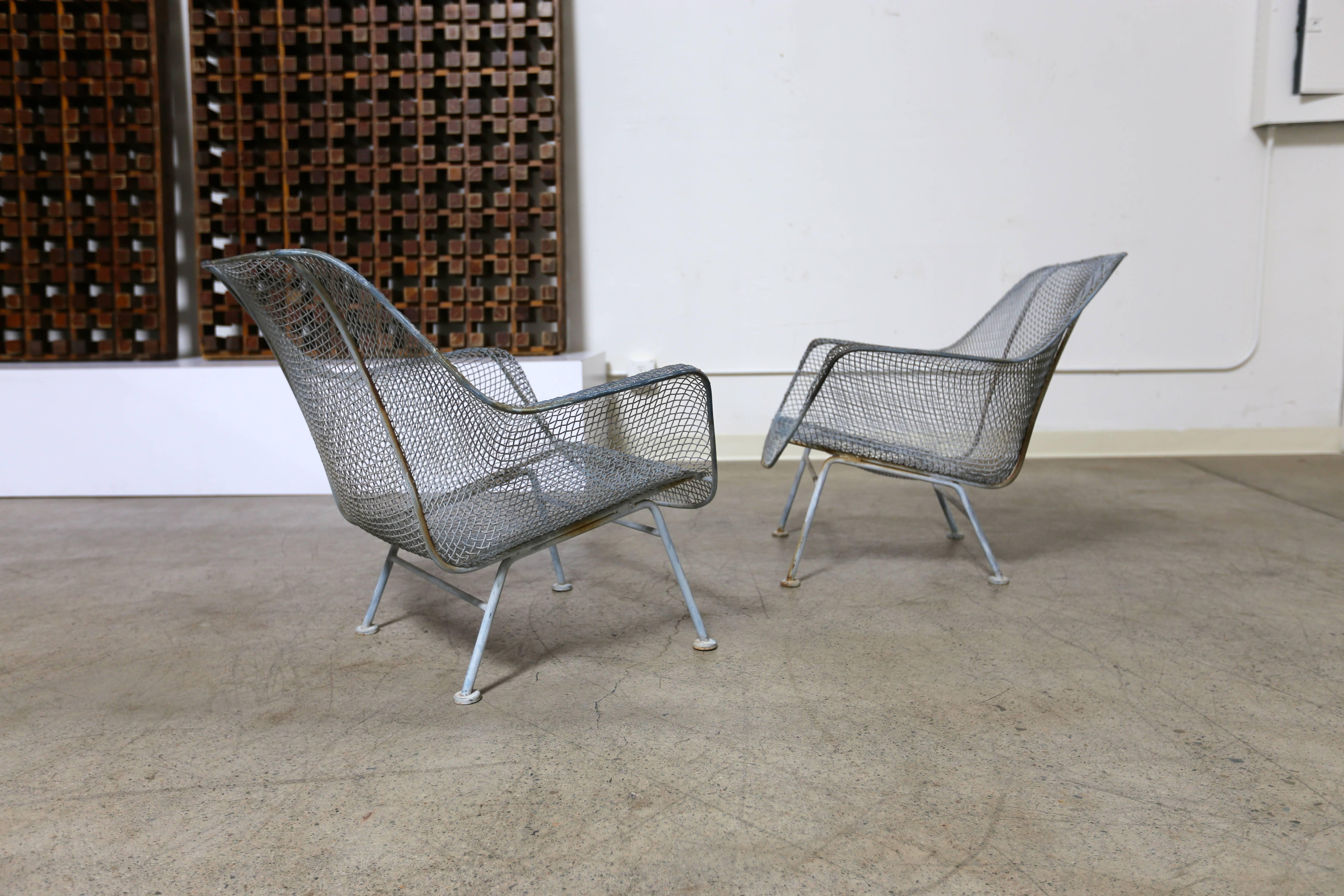 Pair of "Sculptra" lounge chairs by Russell Woodard.