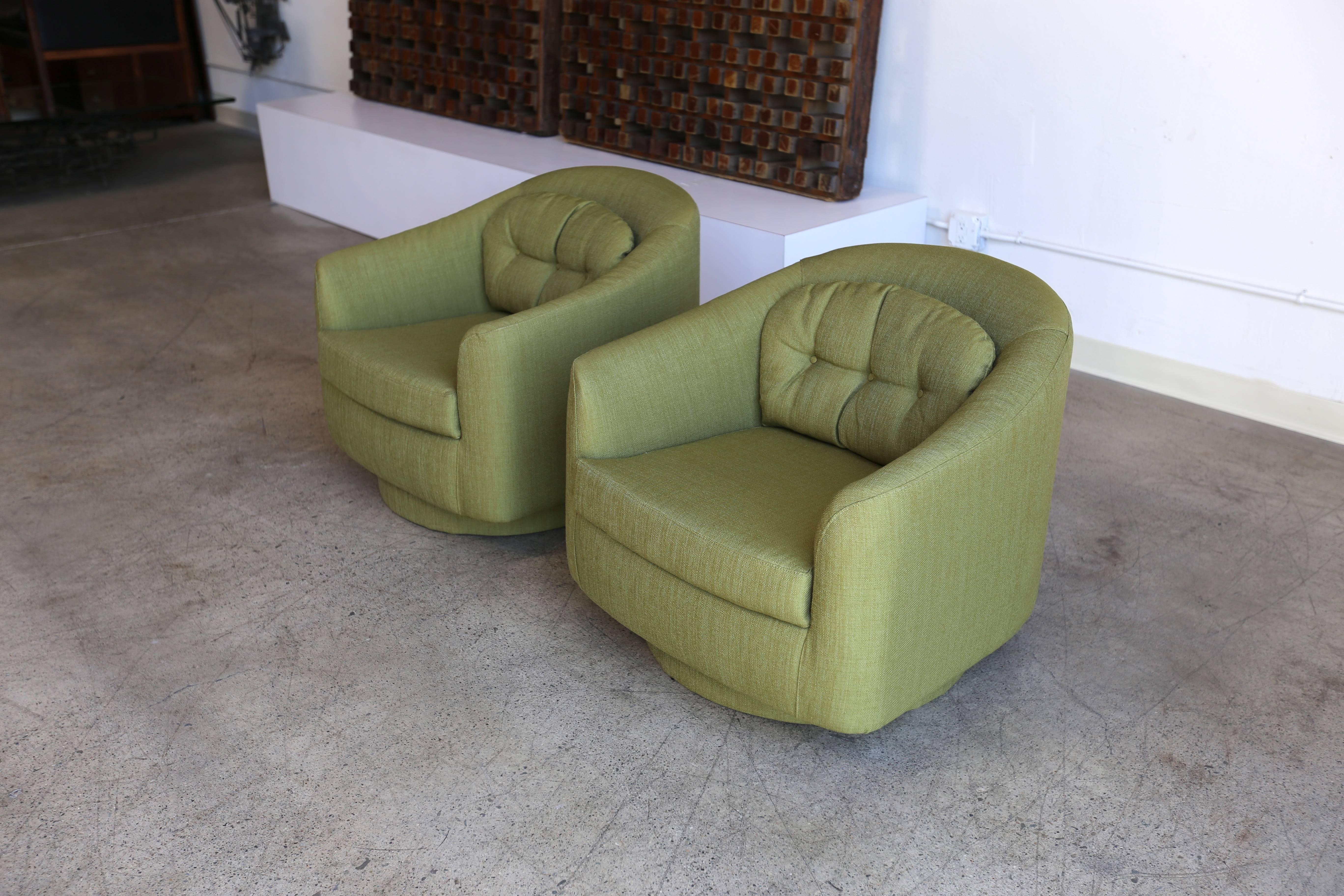 Pair of swivel and tilt lounge chairs by Milo Baughman for Directional.