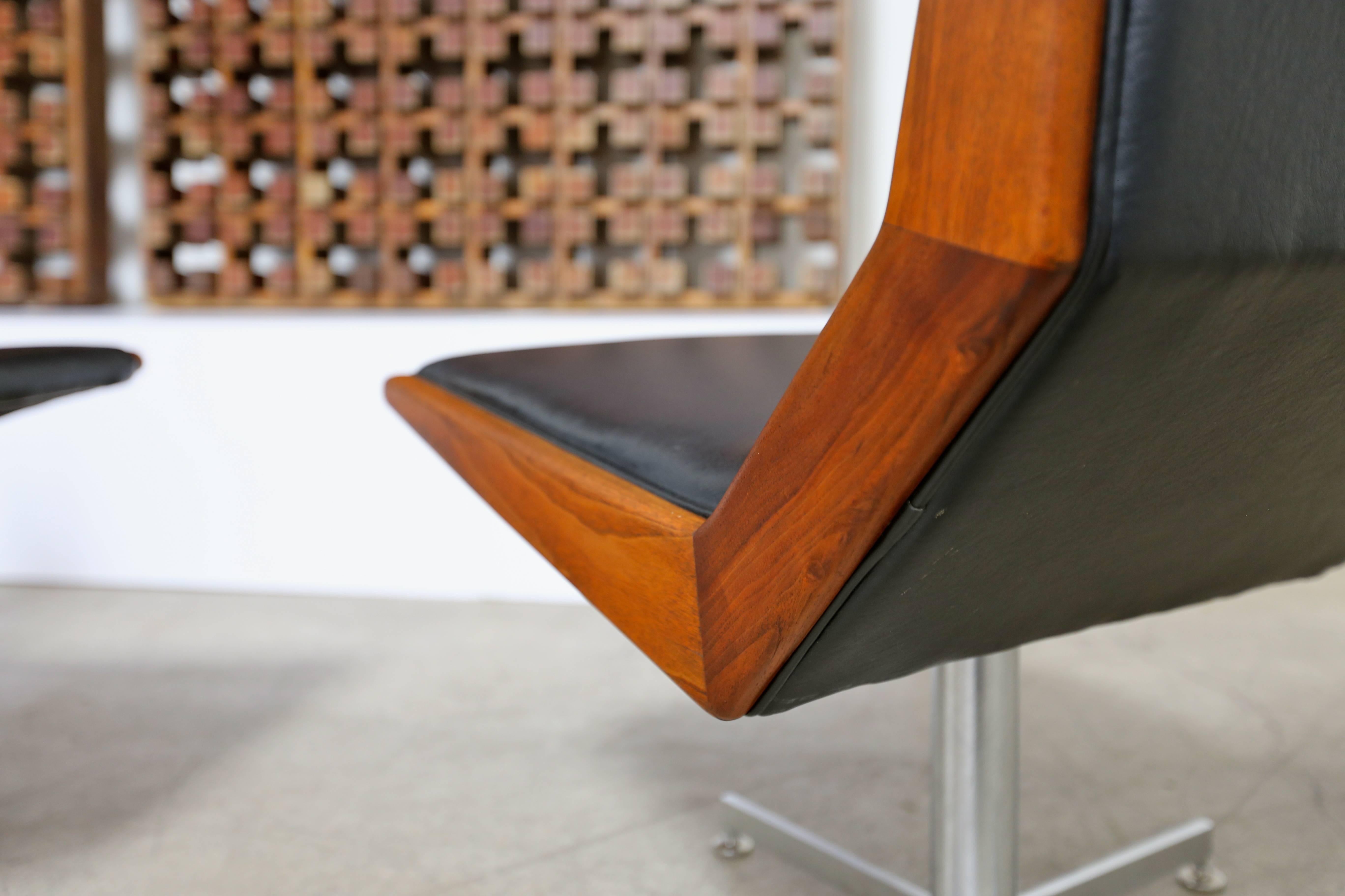 American Pair of Modernist Walnut Framed Swivel Chairs