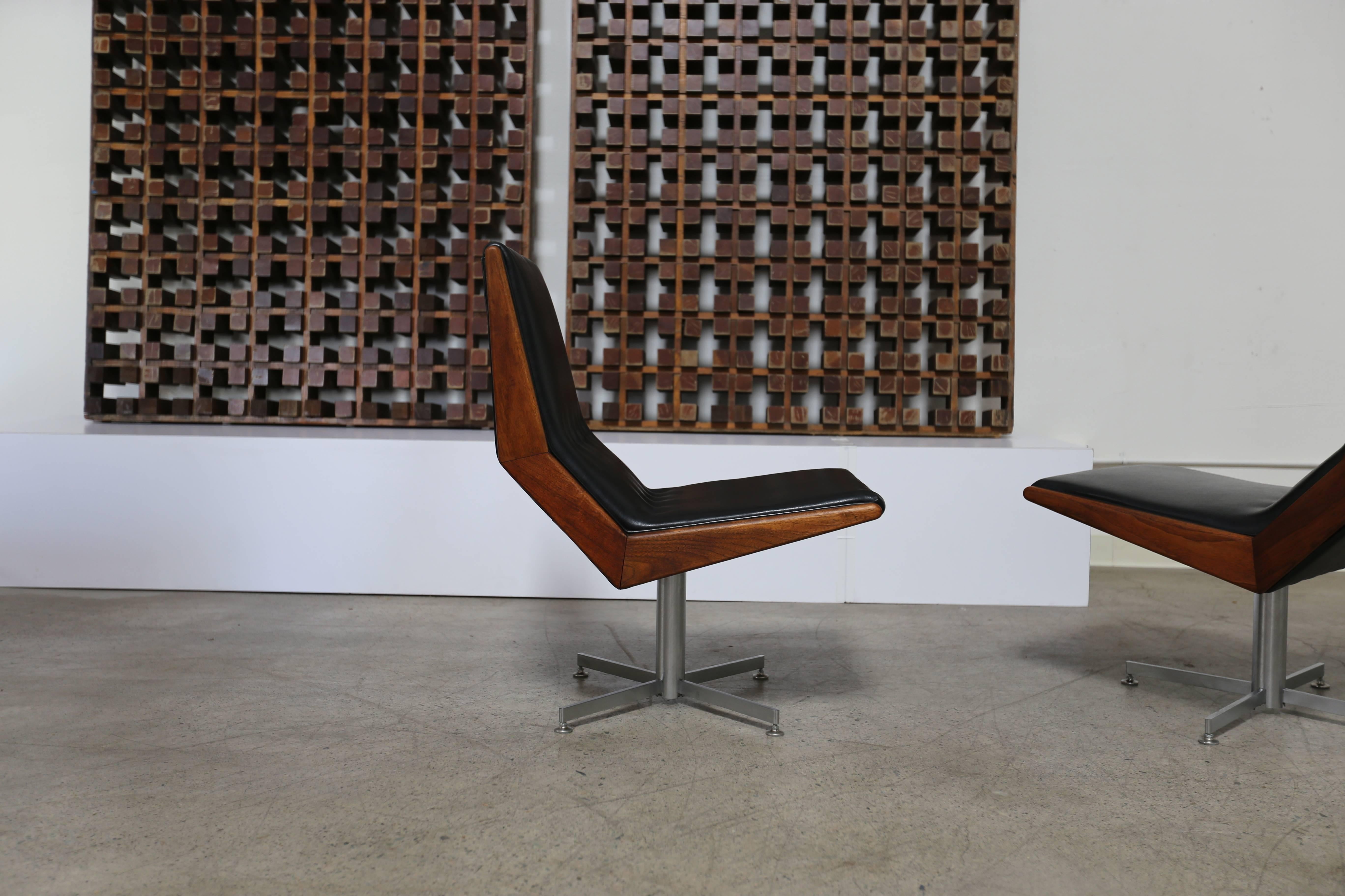 20th Century Pair of Modernist Walnut Framed Swivel Chairs