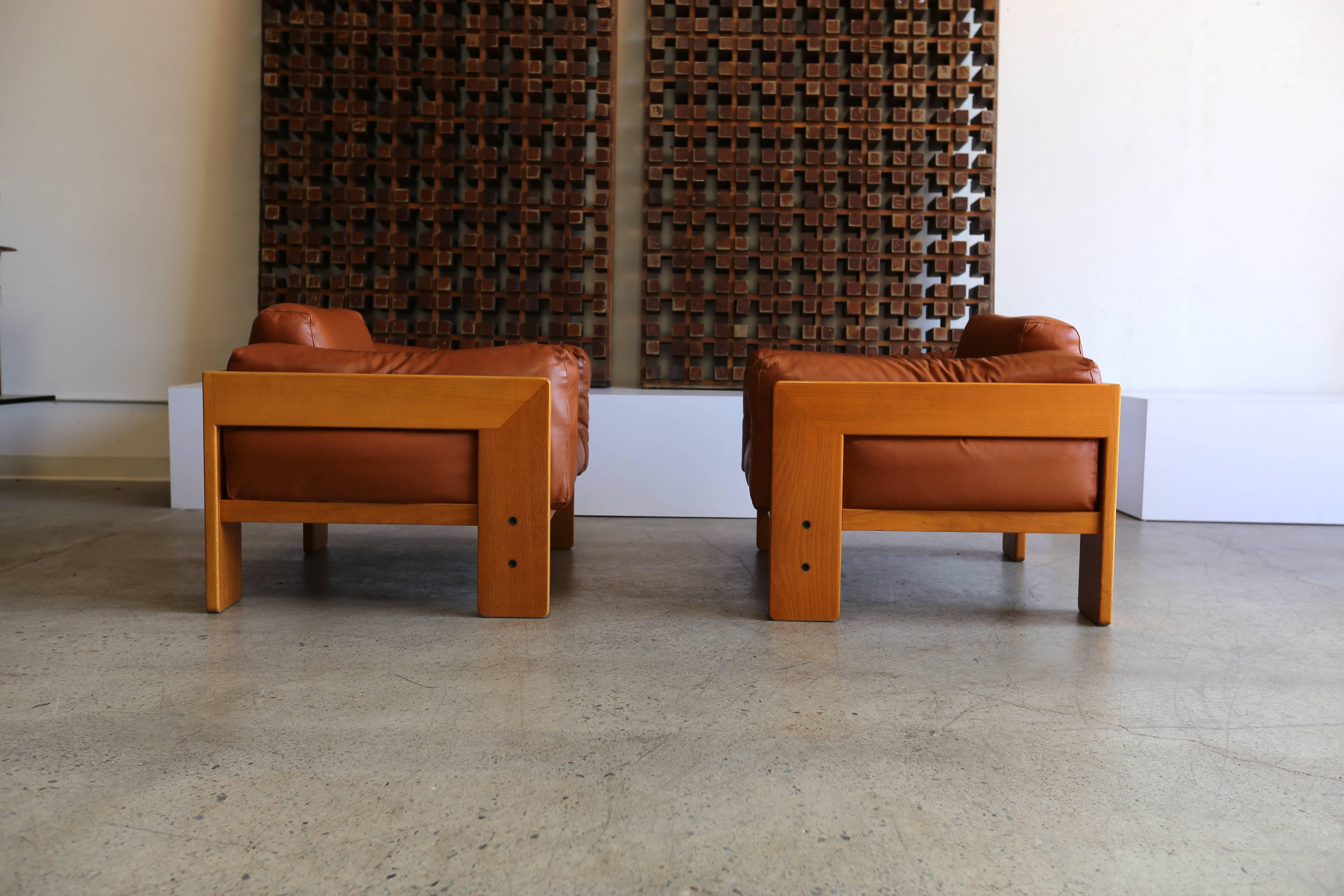 Pair of leather lounge chairs by Tobia Scarpa.