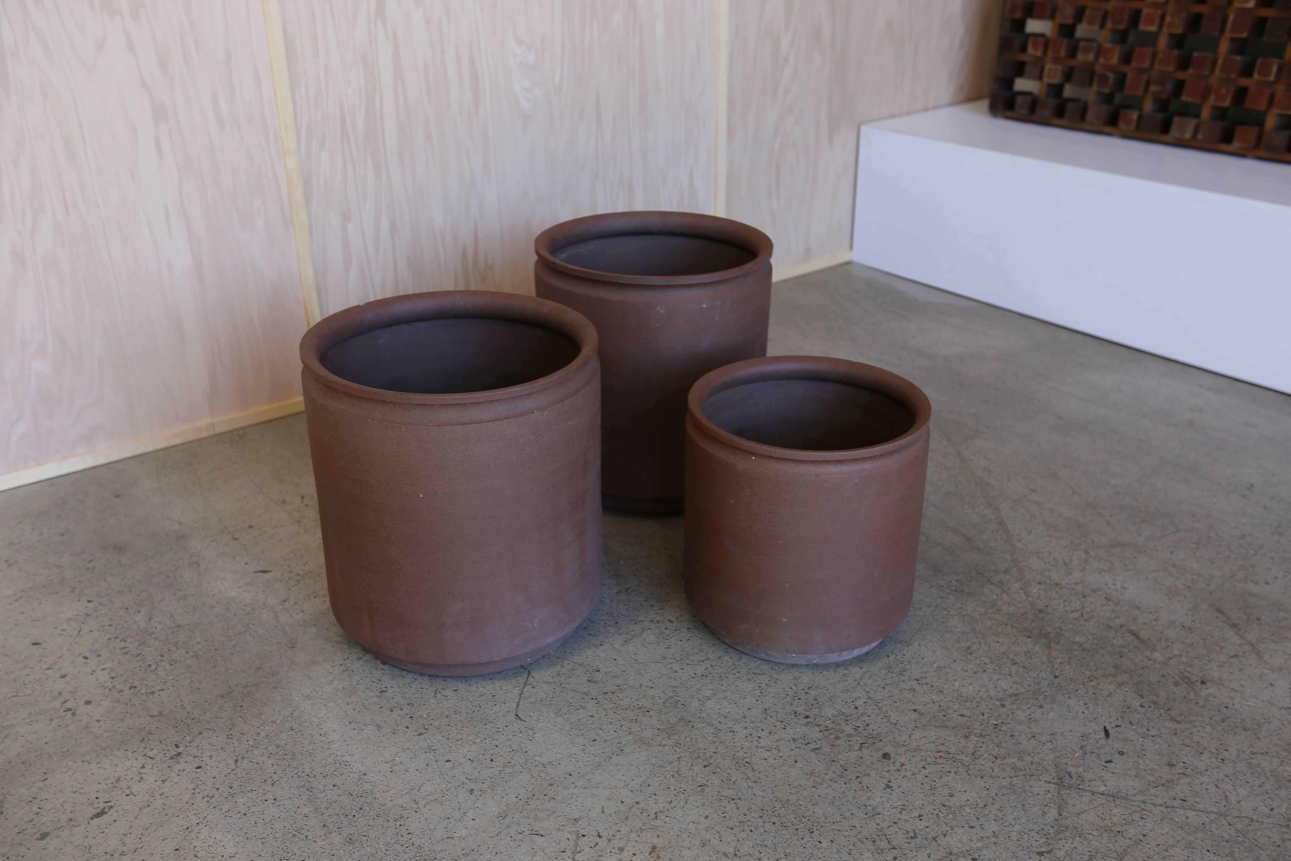 Group of three ceramic planters by David Cressey and Robert Maxwell for Earthgender Ceramics. 
Two planters measure: 17.25" x 18" x 19.5" tall. 

 One planter measures: 14.75 x 14.75 x 15.25" tall.