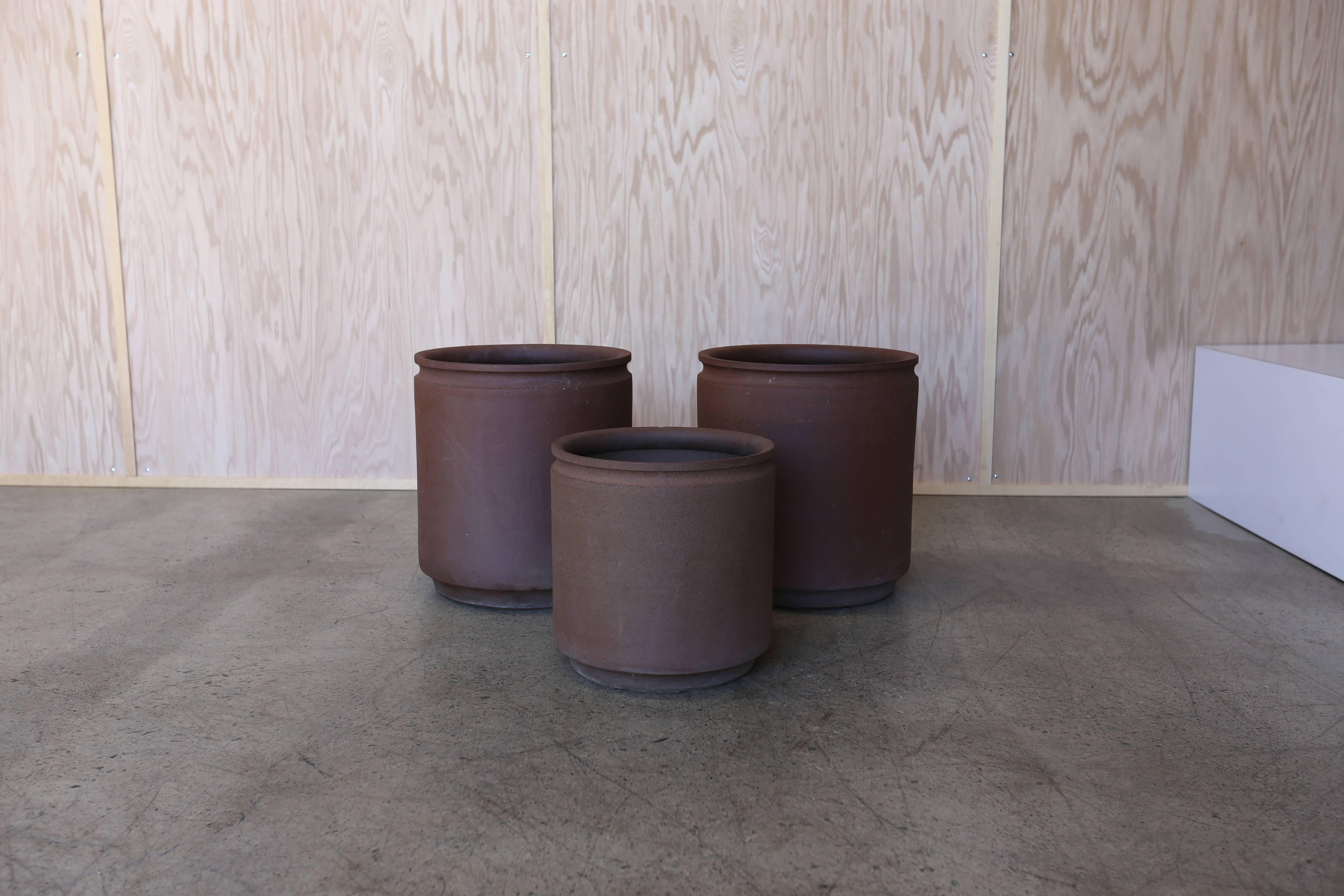 Group of three ceramic planters by David Cressey and Robert Maxwell for Earthgender Ceramics. 

Two planters measure: 17.25" x 18" x 19.5" tall. 

One planter measures: 14.75 x 14.75 x 15.25" tall.