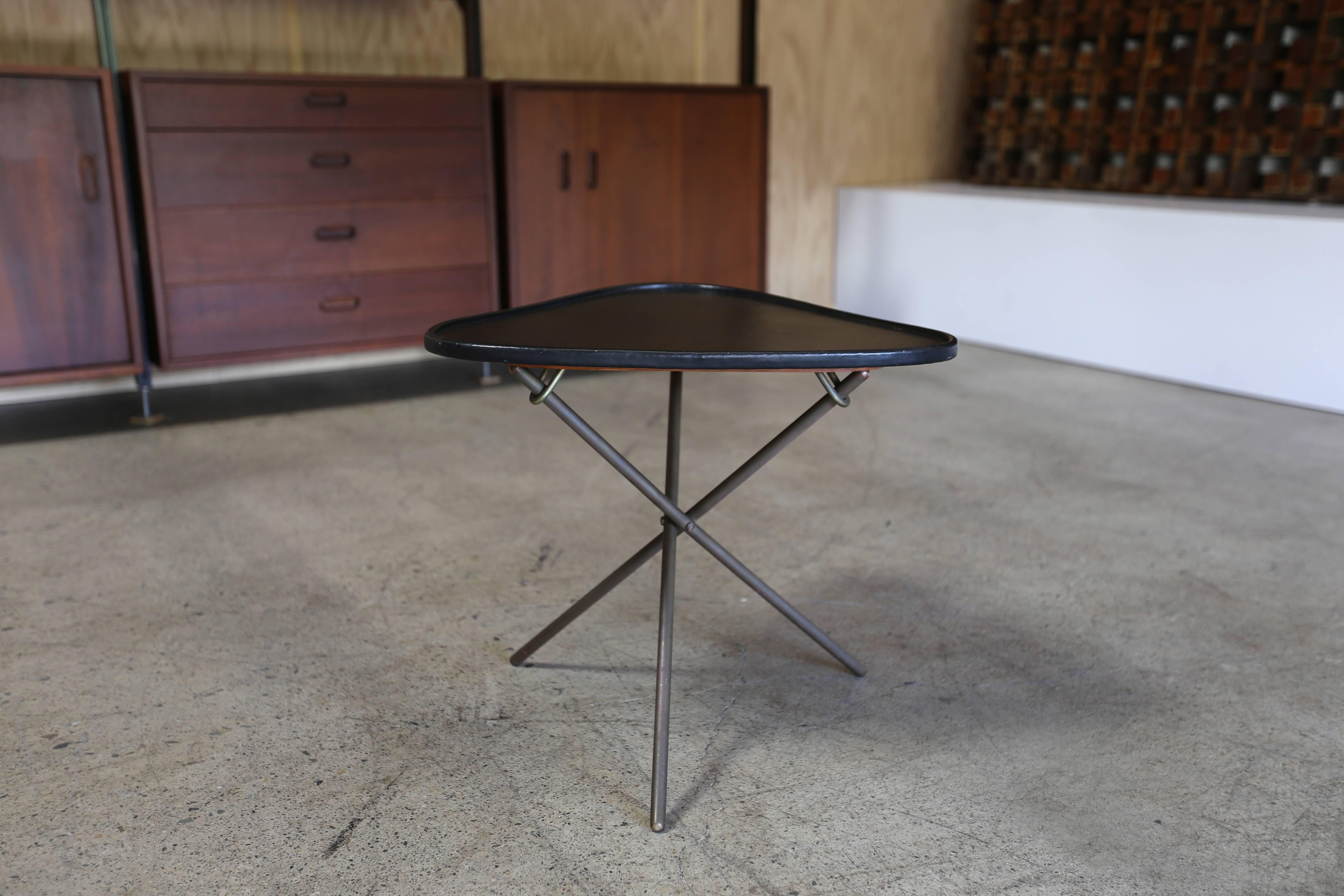 Side table by Carl Auböck. Leather wrapped top. Brass base has a beautiful original patina. A fine vintage example.