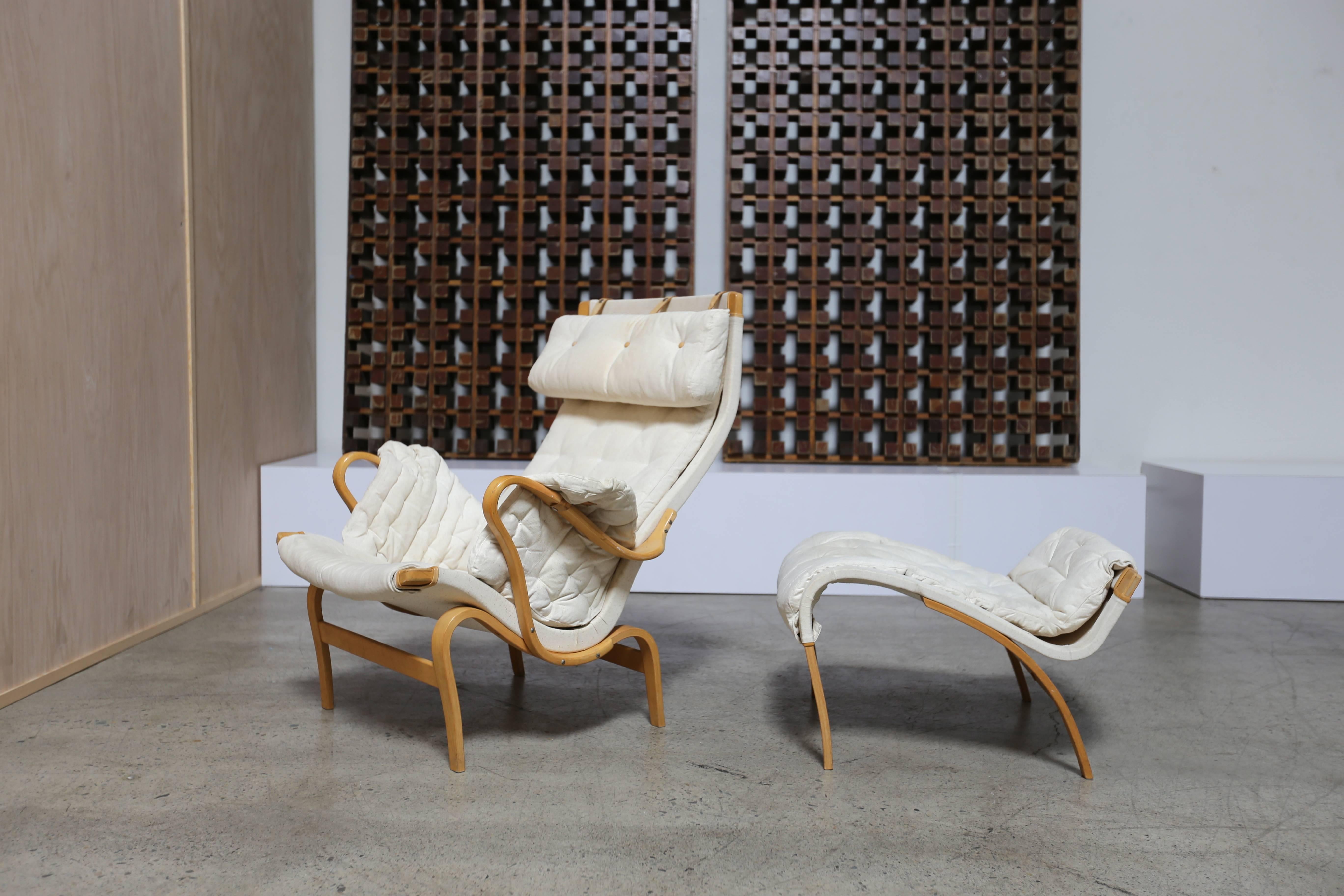 Bentwood Pernilla lounge chair and ottoman by Bruno Mathsson. 

The ottoman measures: 24.5