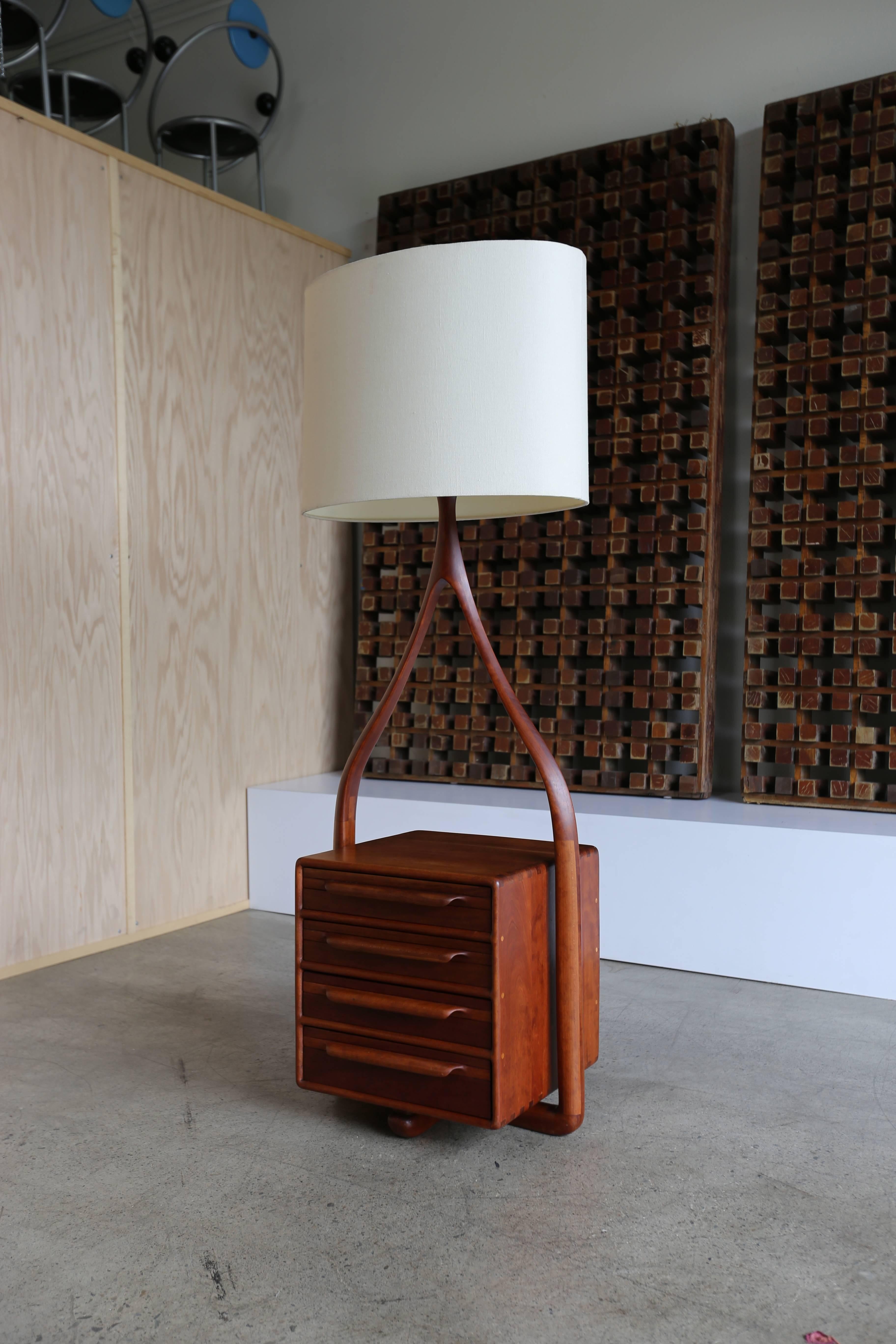 Handcrafted floor lamp by Tom Tramel, 1970s. From the estate of Tom Tramel. The drawers pass through to both sides of the lamp base. Sculptural 