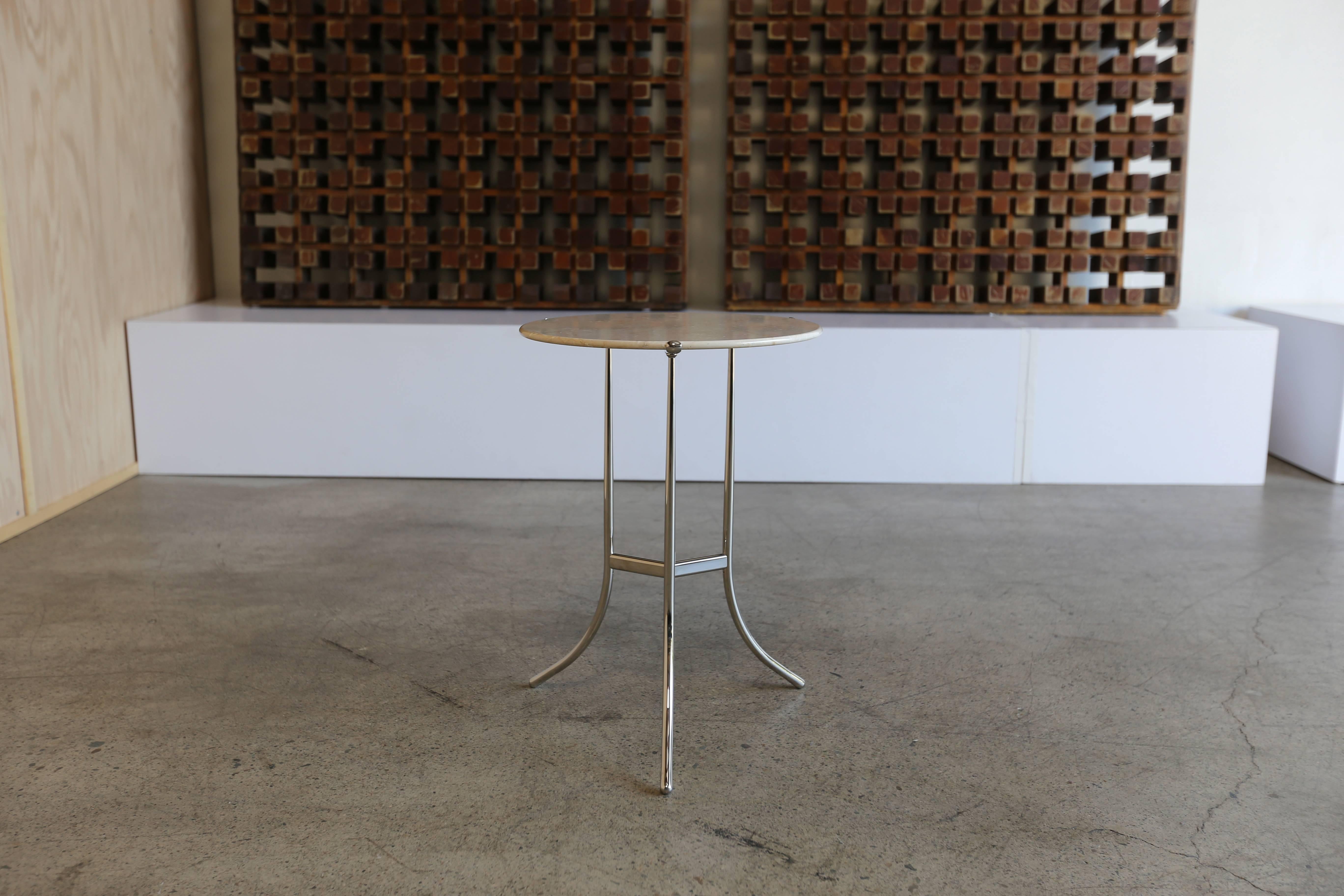 Marble occasional/side table by Cedric Hartman. This piece is signed to the bottom.