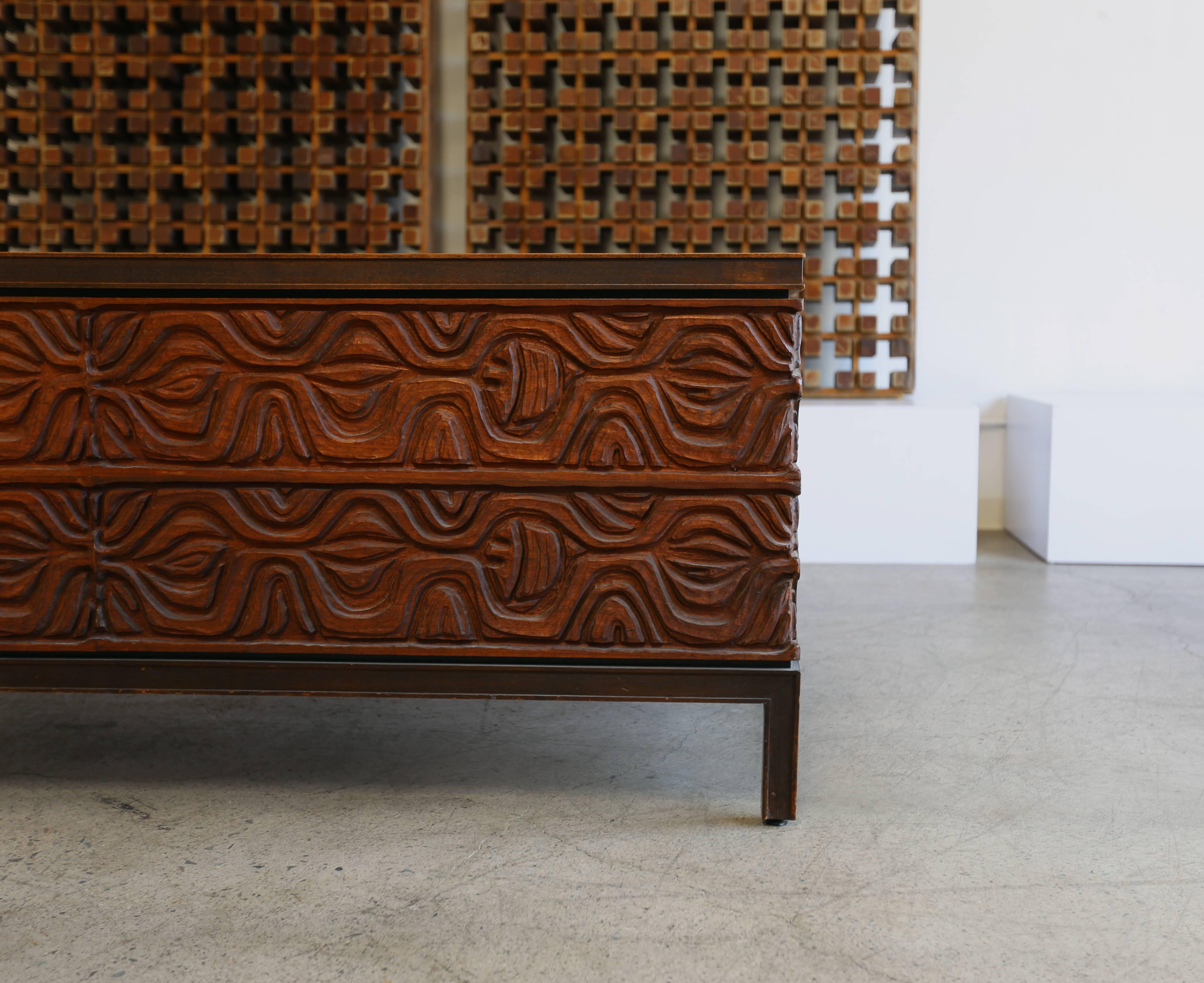 Sculptural walnut and Panelcarve desk by Murray Feldman for A. E. Furniture. Similar example on page 66 of California design or nine.
