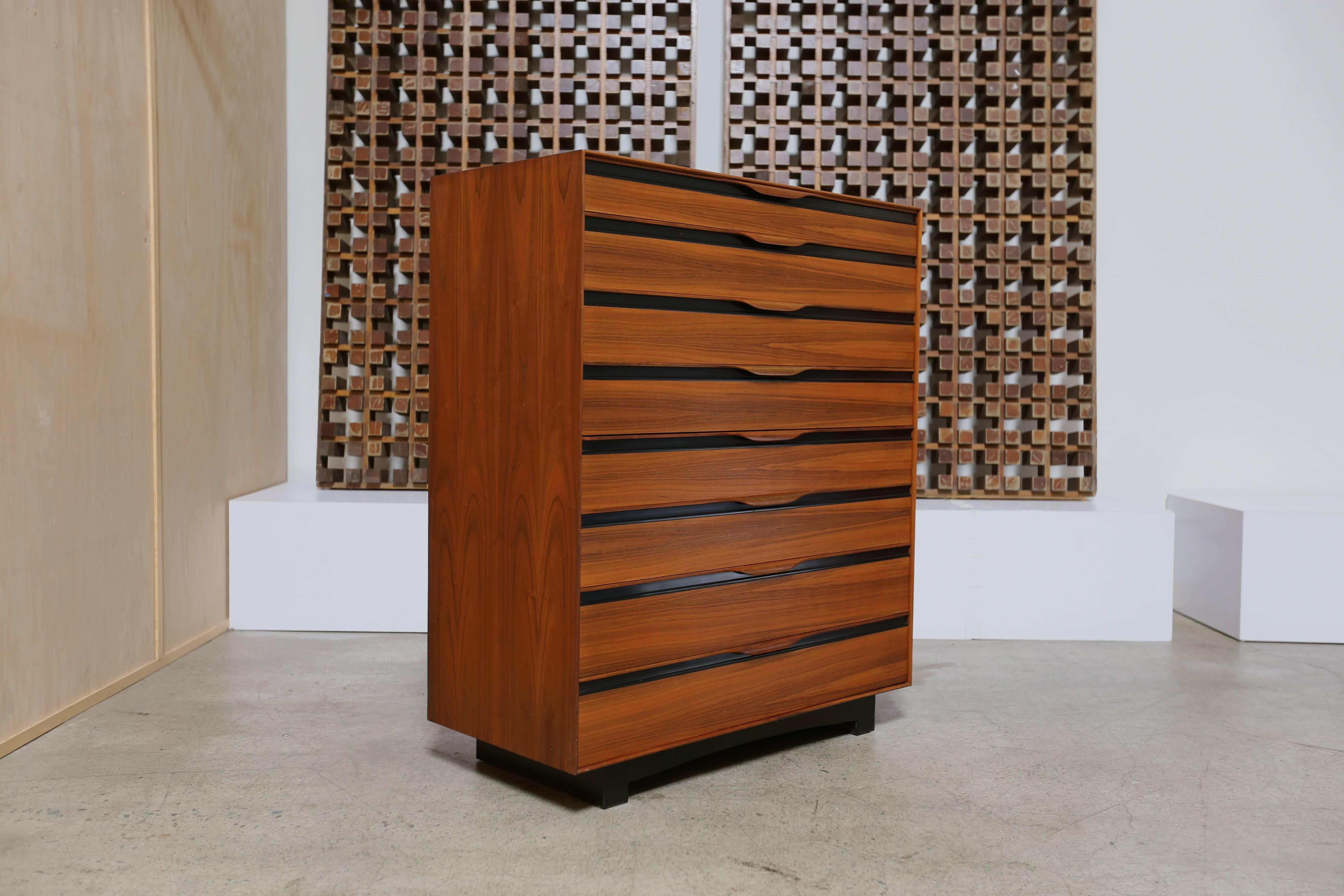 Tall / highboy walnut chest of eight drawers by John Kapel for Glenn of California. A iconic California Modern design.