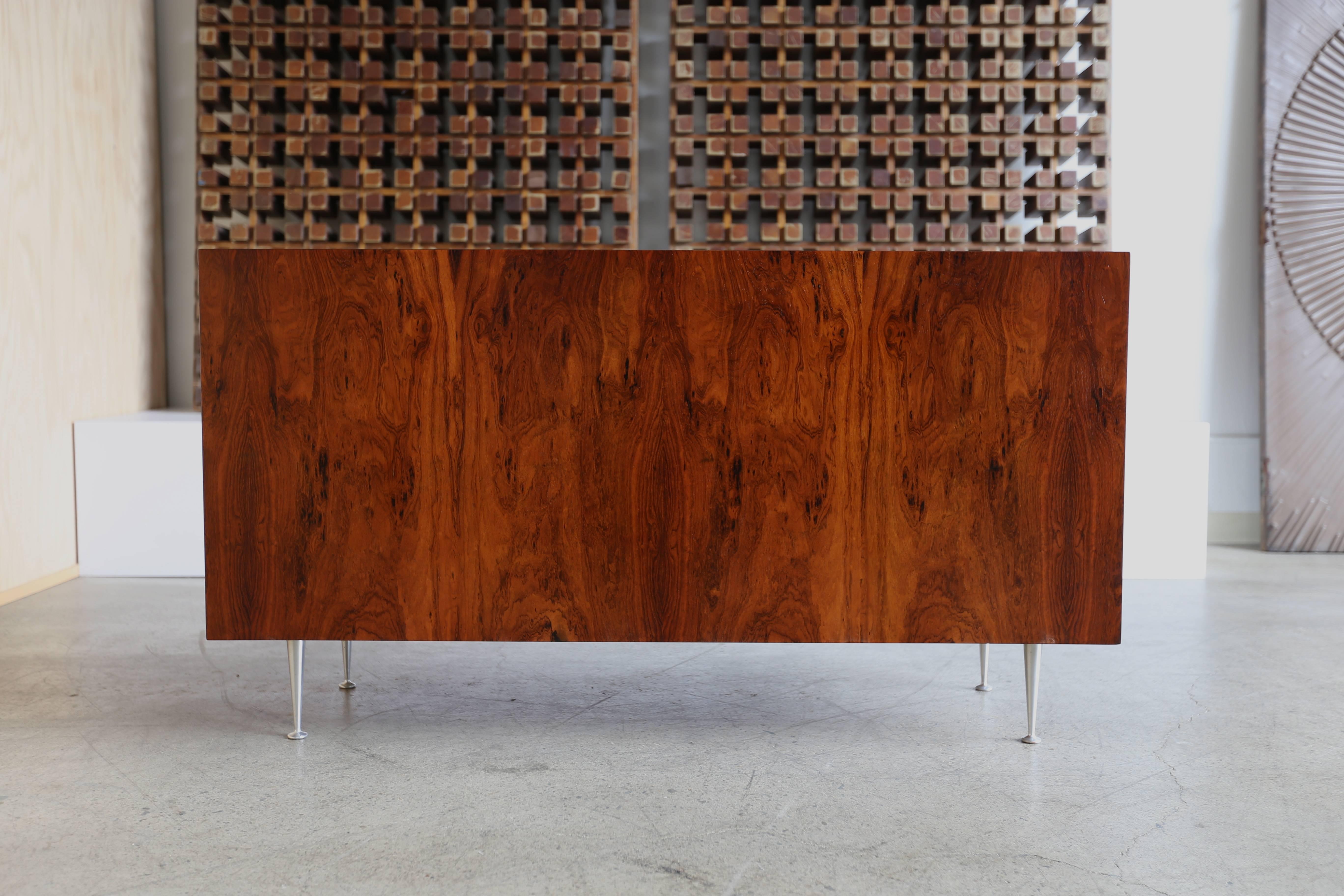 George Nelson rosewood thin edge credenza. This piece has been professionally restored and features a finished back.